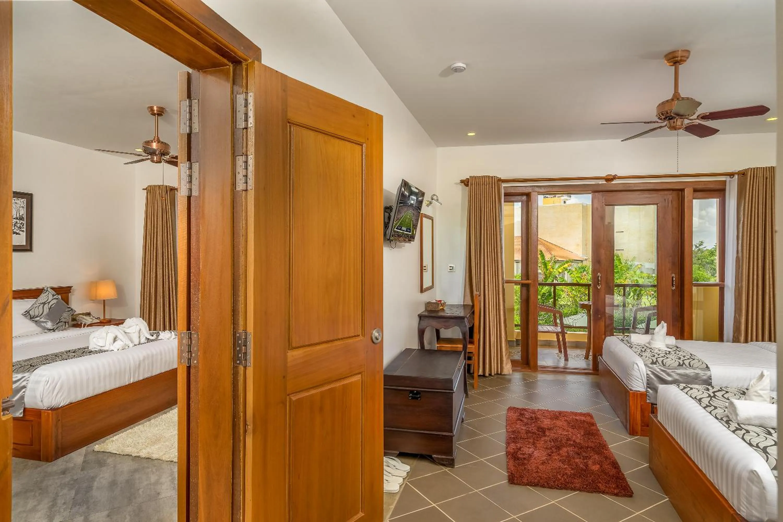 Connecting Suite with Balcony and Pool View in Savada Angkor Boutique Hotel