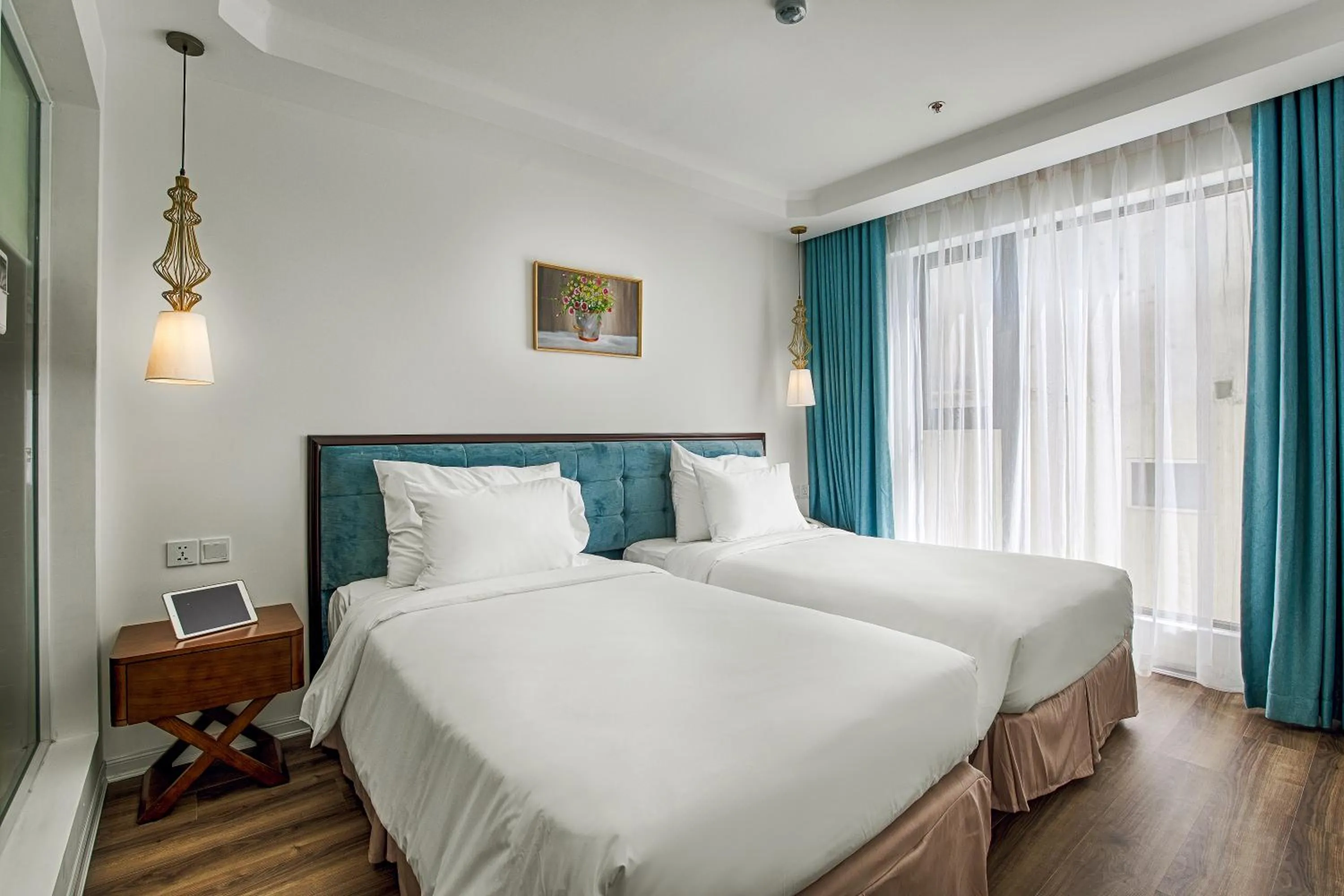 Deluxe Twin Room with Partial Ocean View   in Adaline Hotel and Suite