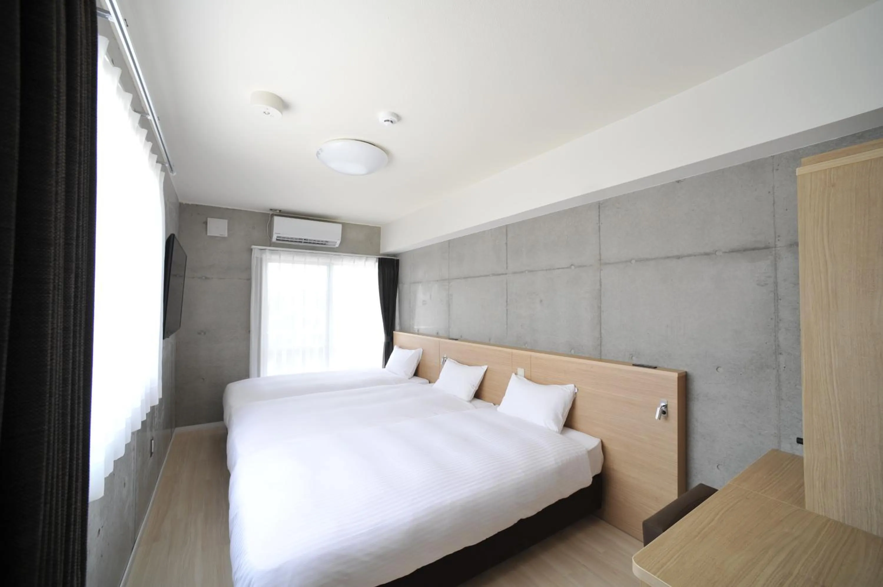 Adjoining Triple Rooms - Non-Smoking in The BREAKFAST HOTEL PORTO Ishigakijima