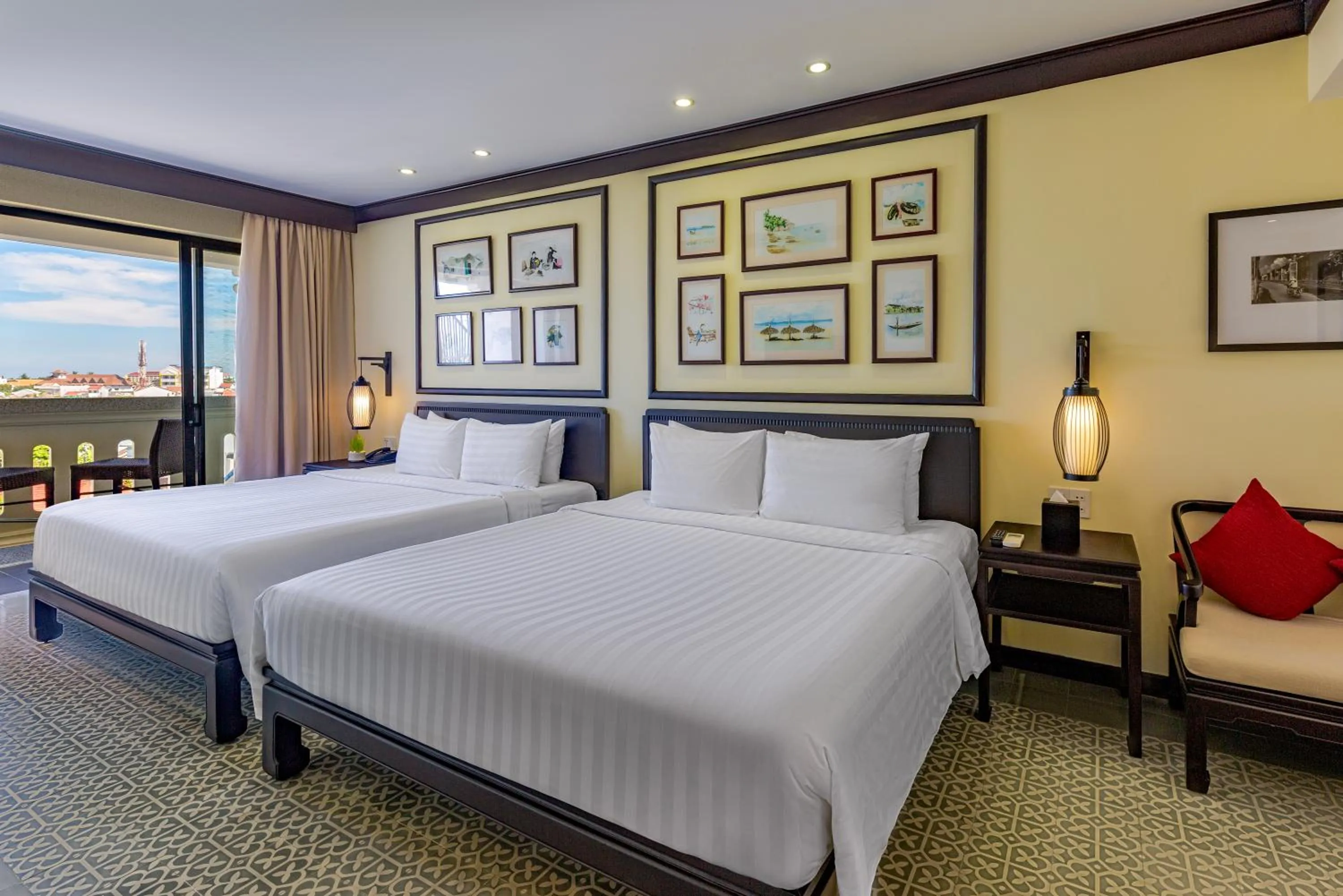 Quadruple Family Room with Balcony - Partial Ocean View in Wyndham Garden Hoi An Cua Dai Beach