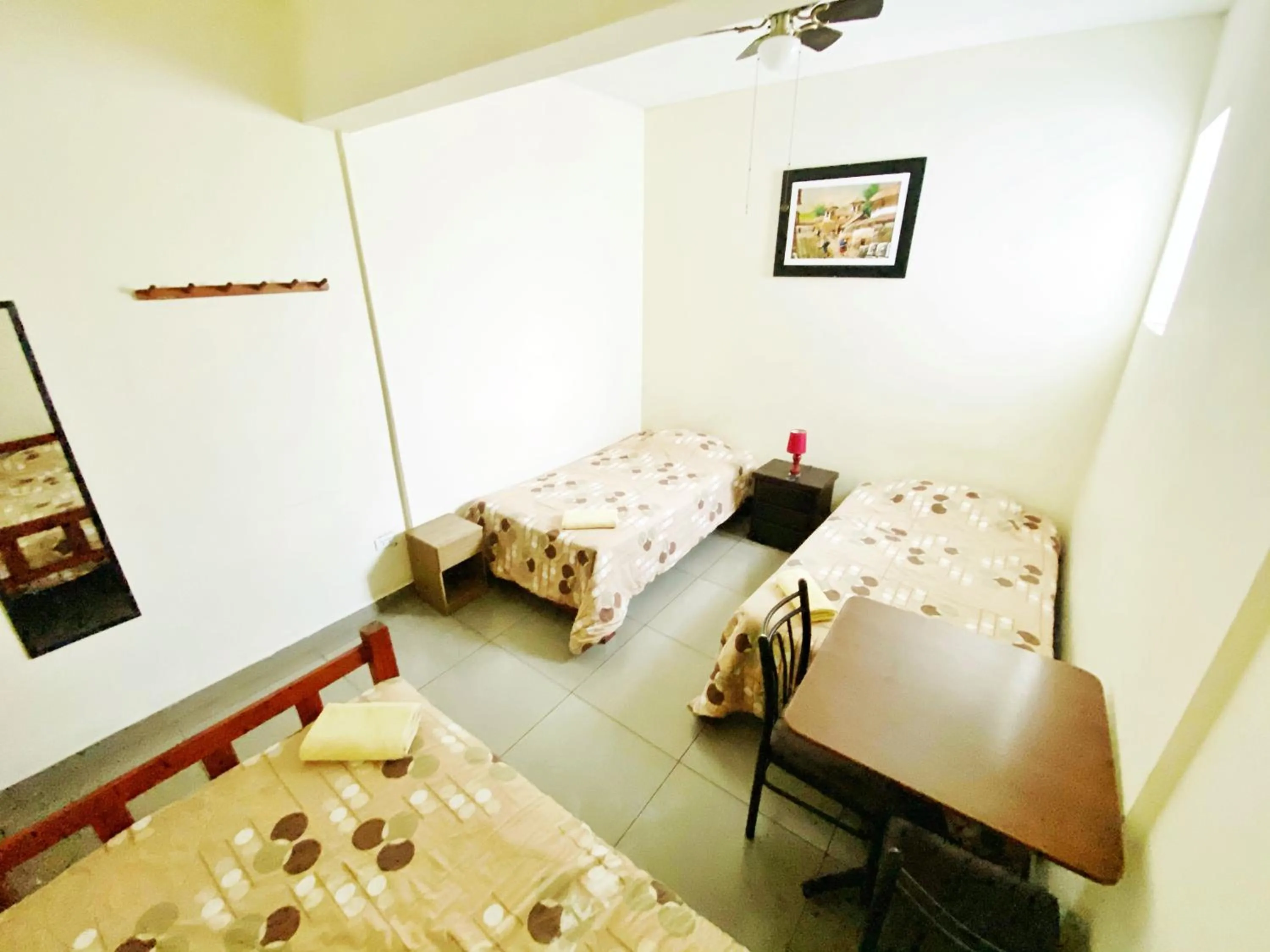 Triple Room with Shared Bathroom in Lima House Hostel