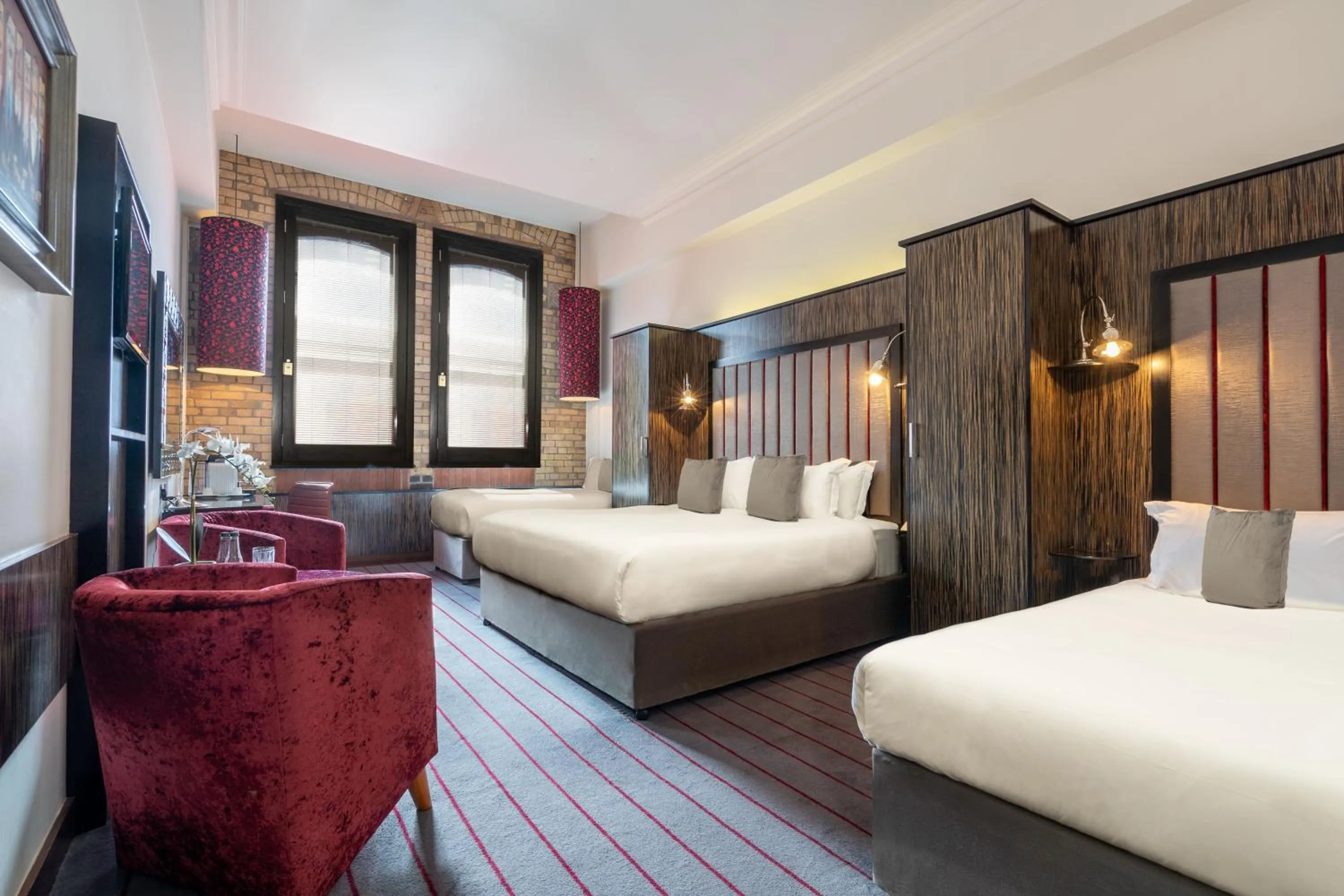 Executive Triple Room in The Trinity City Hotel