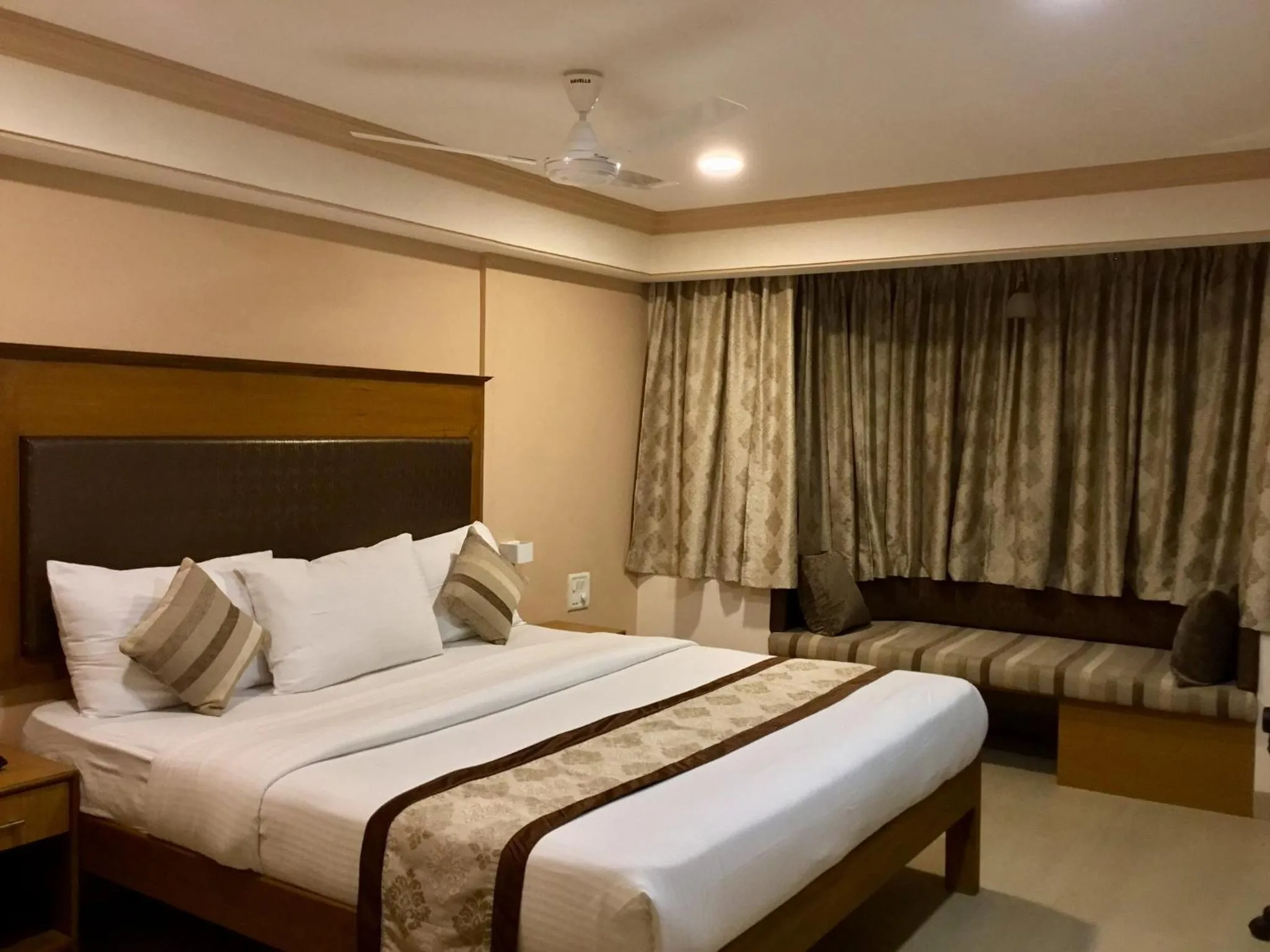 Deluxe Room (2 Adults + 1 Child) - single occupancy in Sai Towers