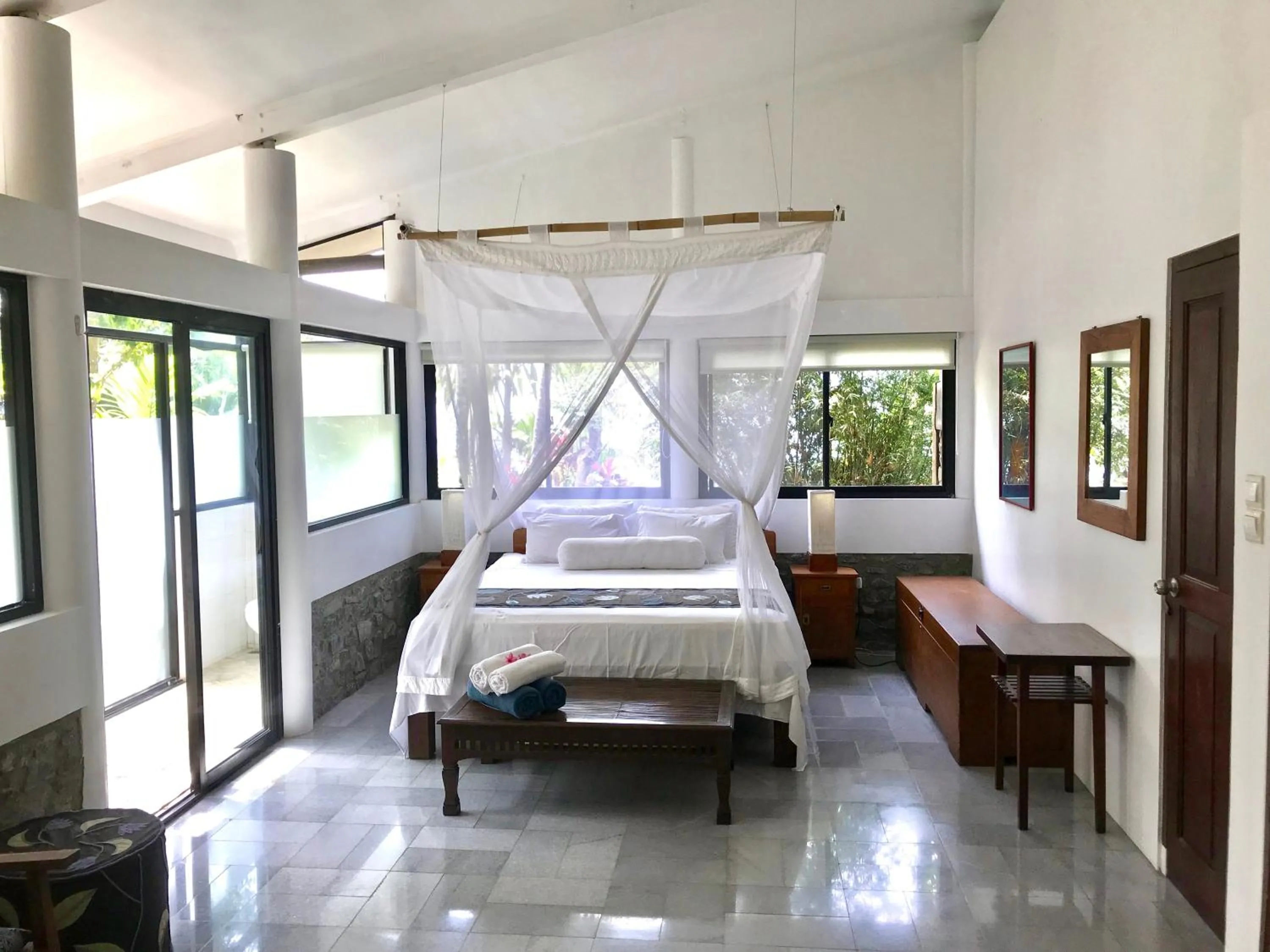 Deluxe Double Room with Side Sea View in Puncak Air Manis Residence