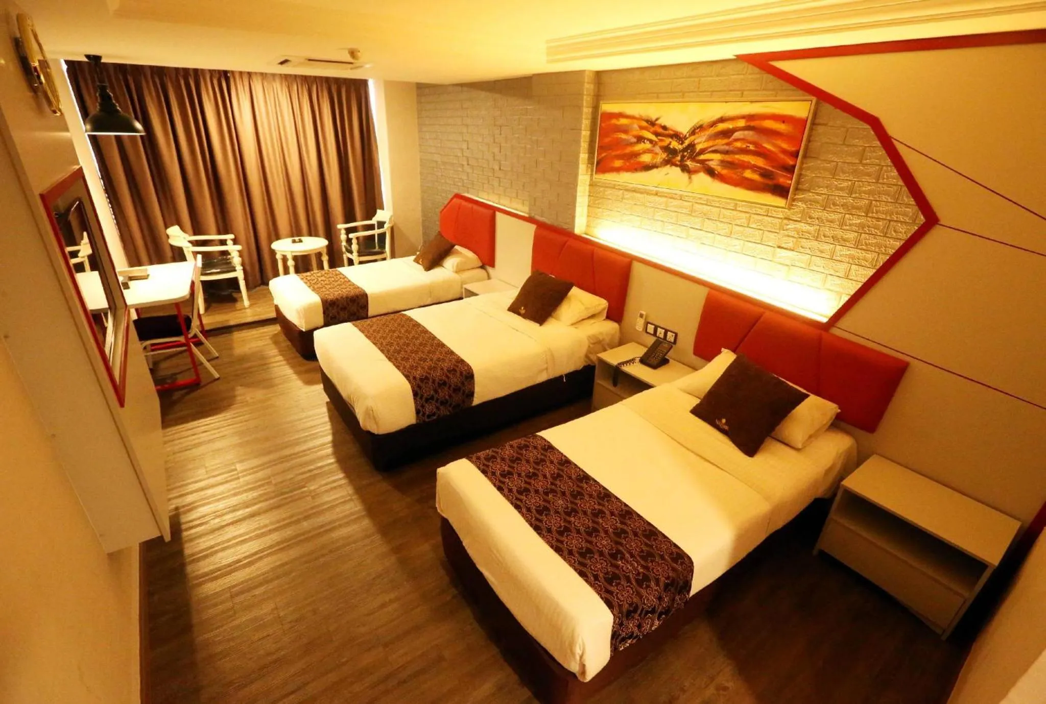 Deluxe Triple Room in Golden Nasmir Hotel