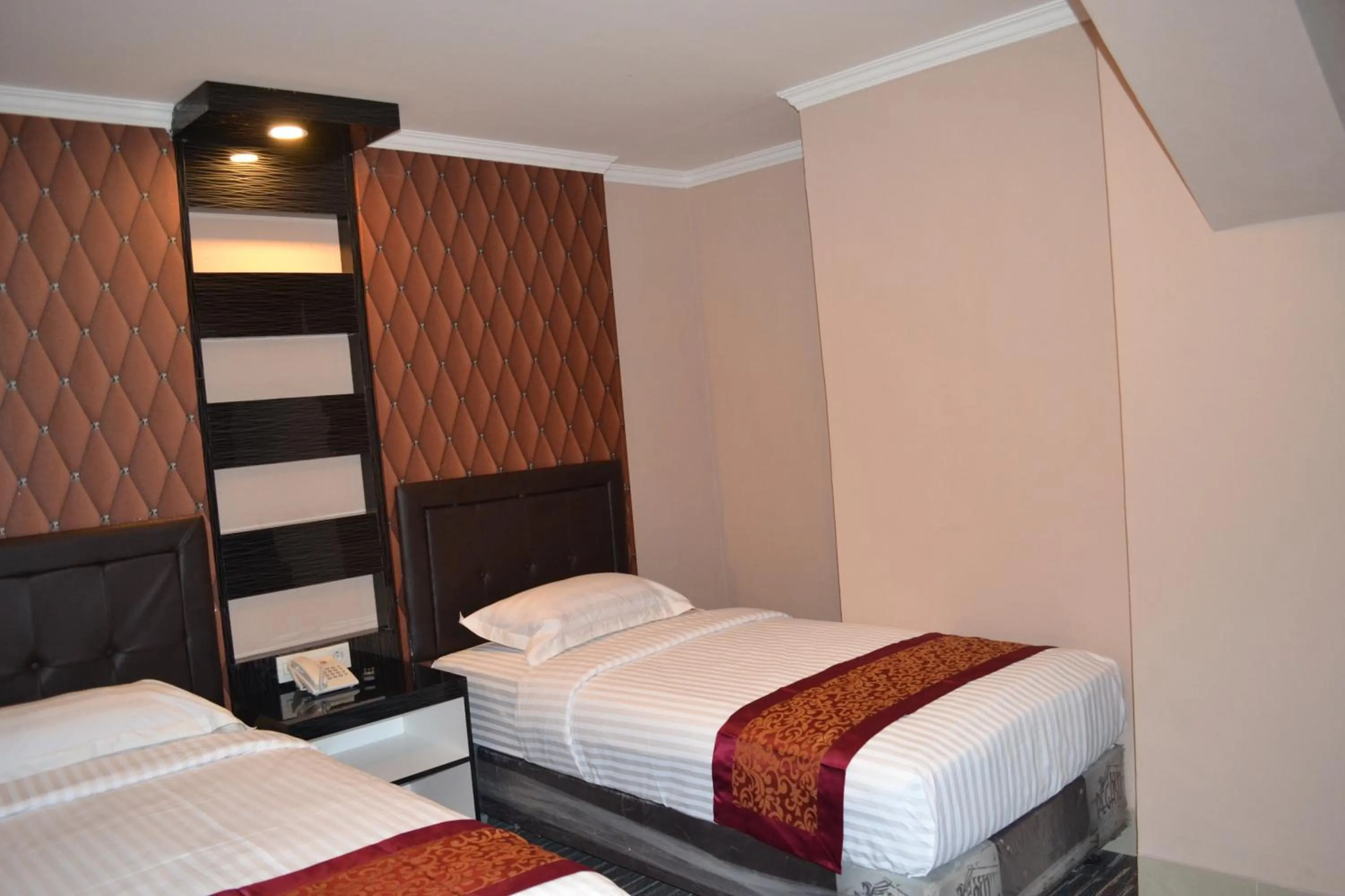 Superior Twin Room in Puncak Budget Hotel