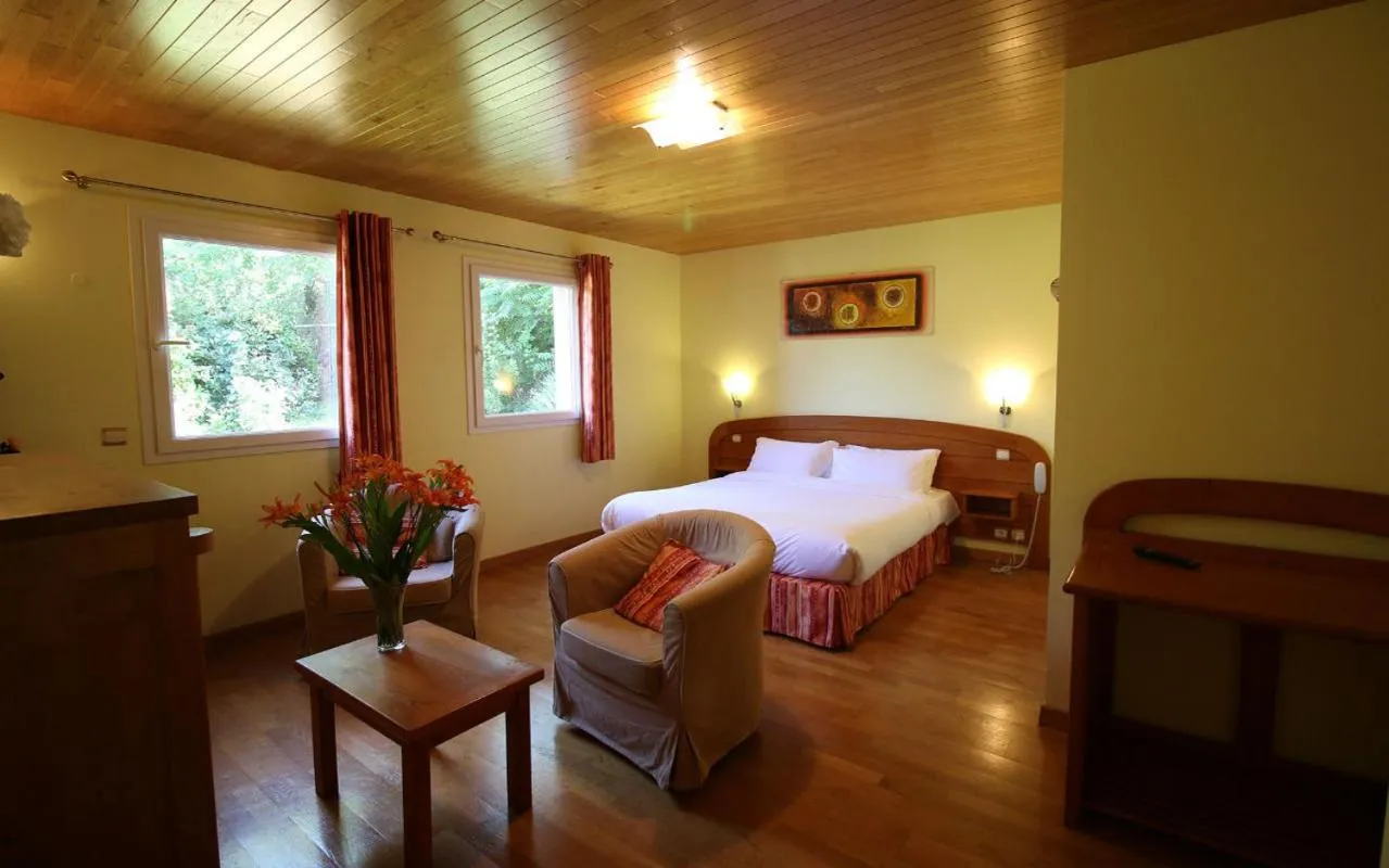 Family Room in Logis Hôtel-restaurant La Mère Biquette