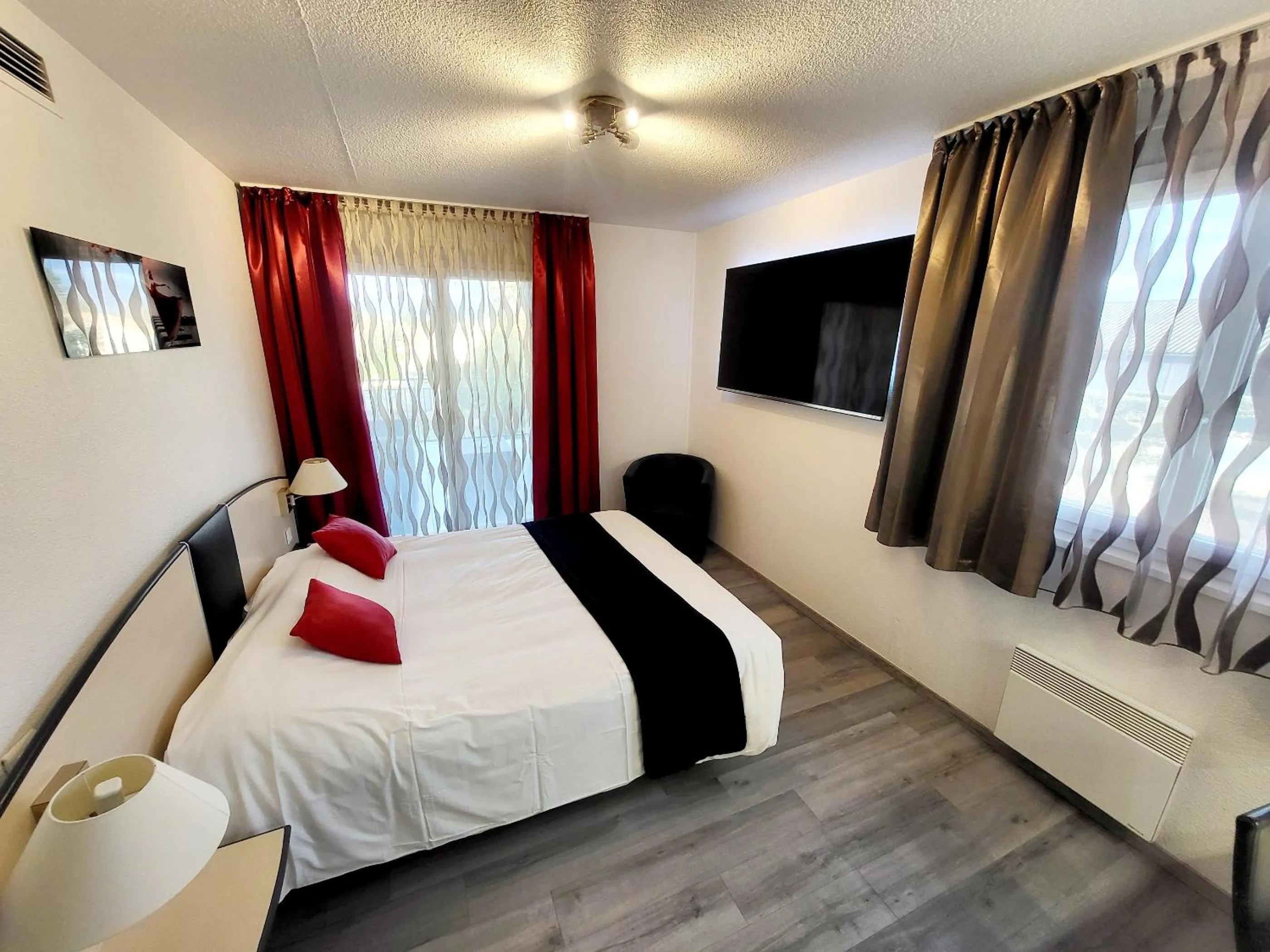 Family Room with Terrace in Citotel Hôtel Le Capricorne