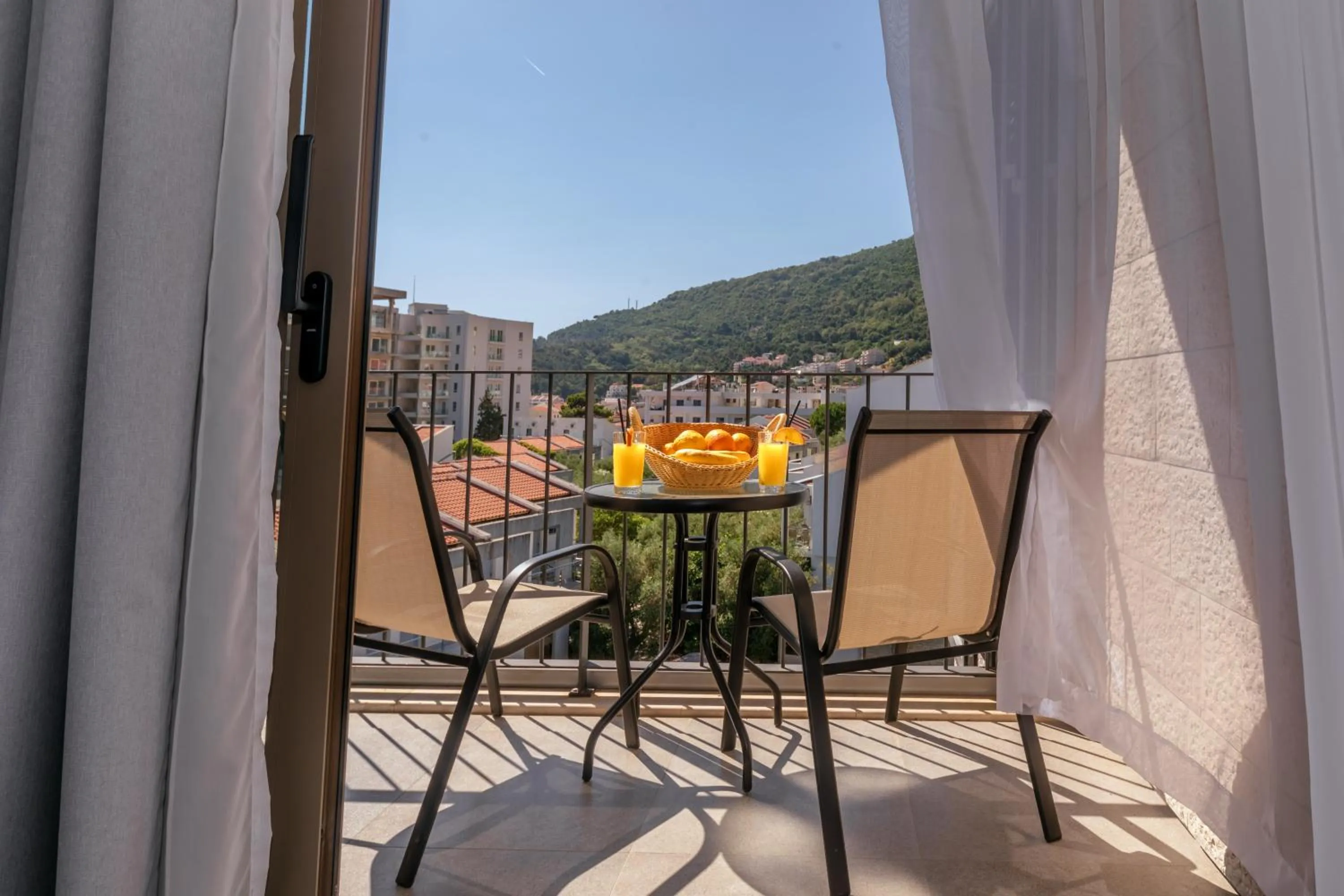Double Room with Balcony - single occupancy in Hotel Eleven