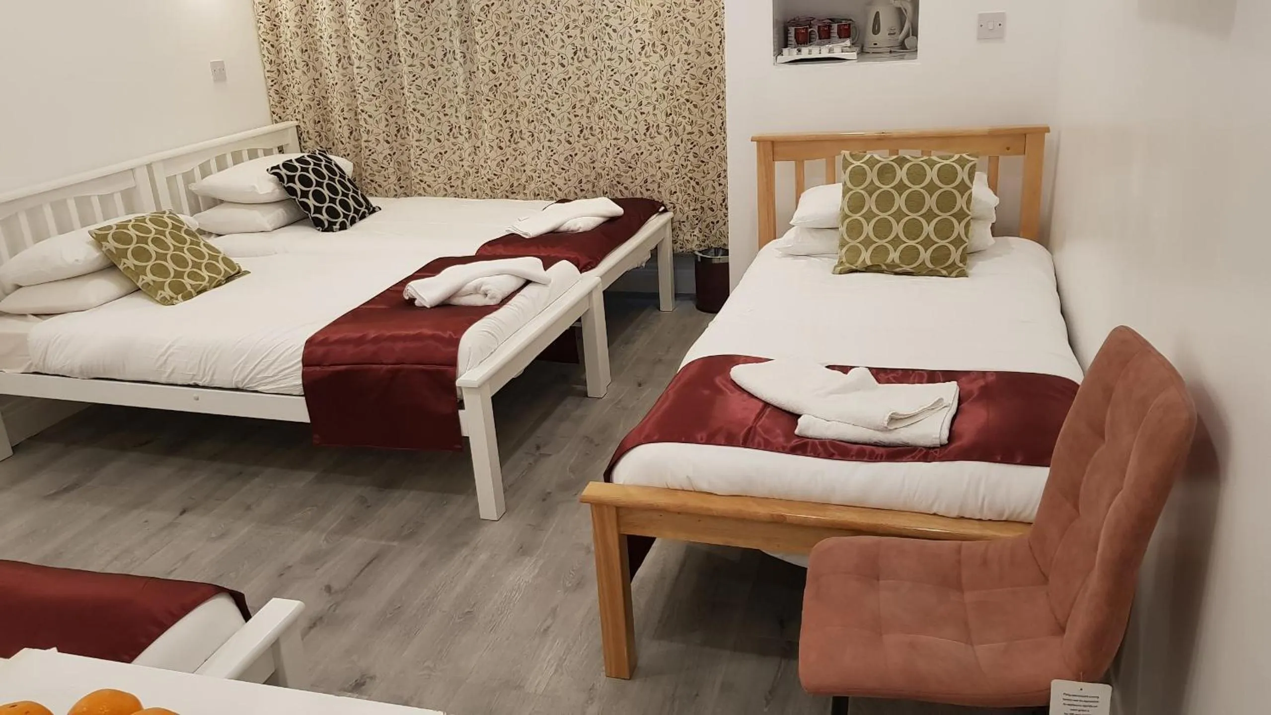 Quadruple Room with Private Bathroom in City London Hotel