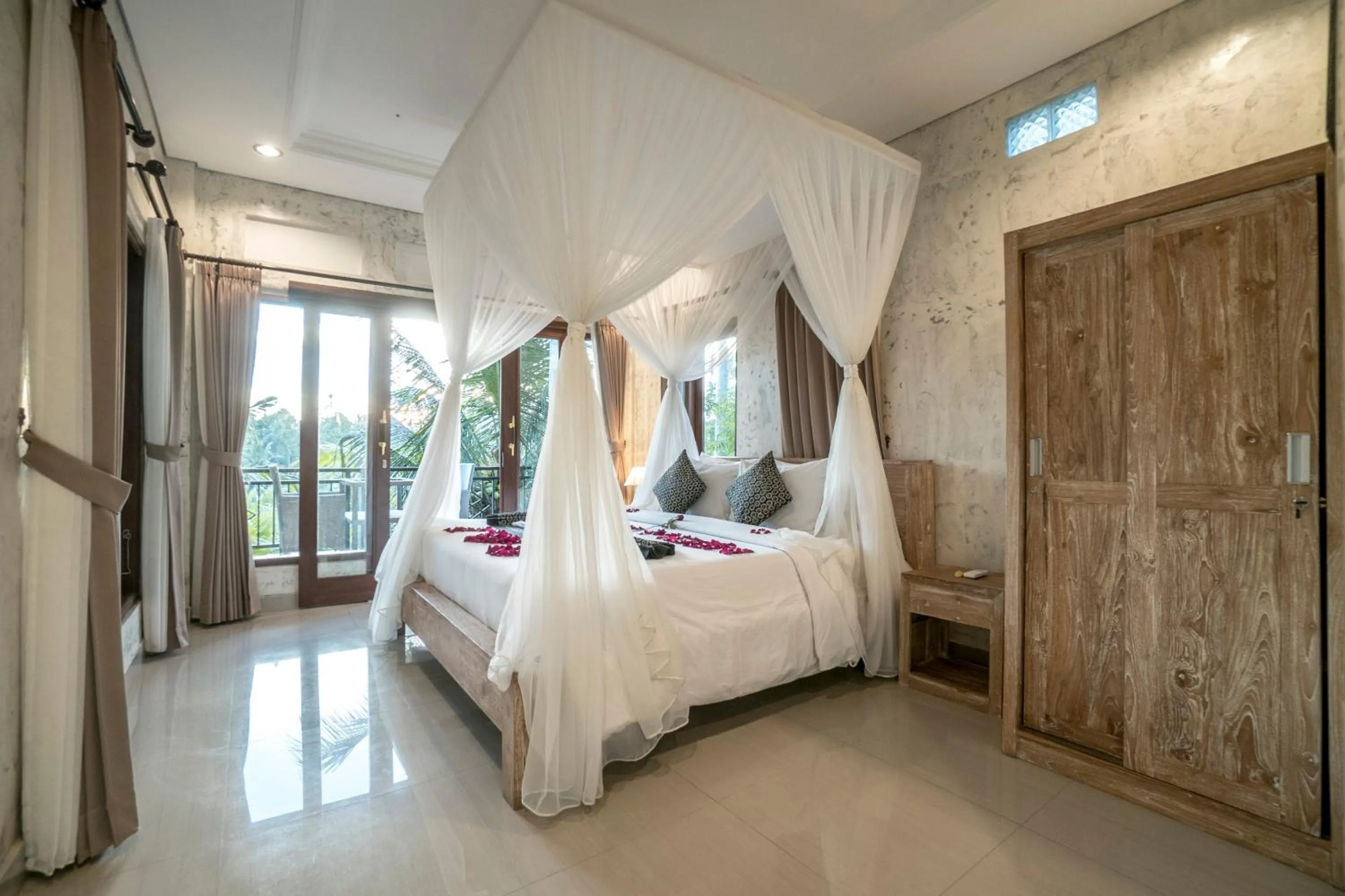 Deluxe Double or Twin Room with Garden View in Adi Bisma Inn by Mahaputra-CHSE Certified