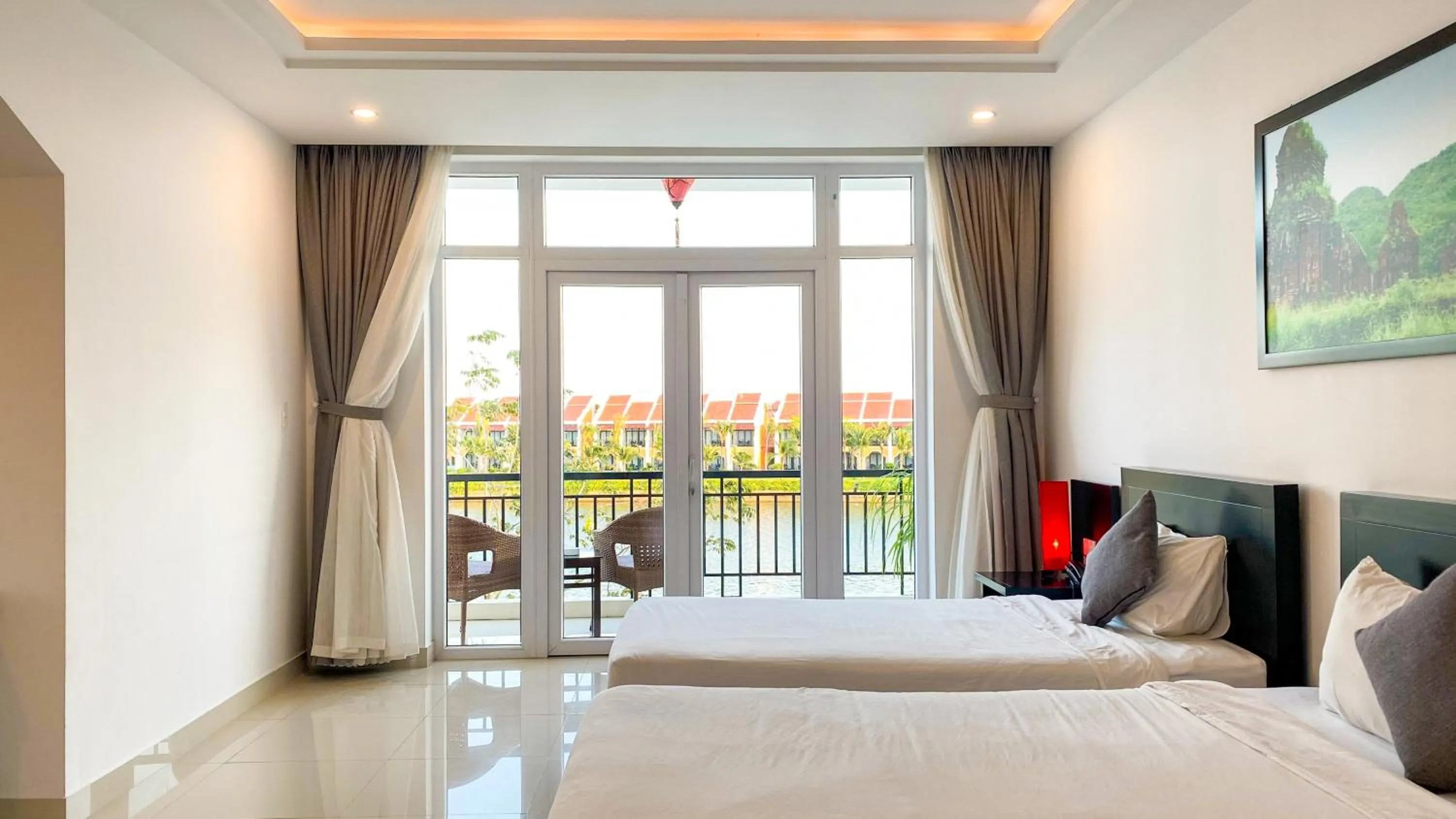 Triple Suite with Balcony and River View in Riverside White House Boutique Hotel