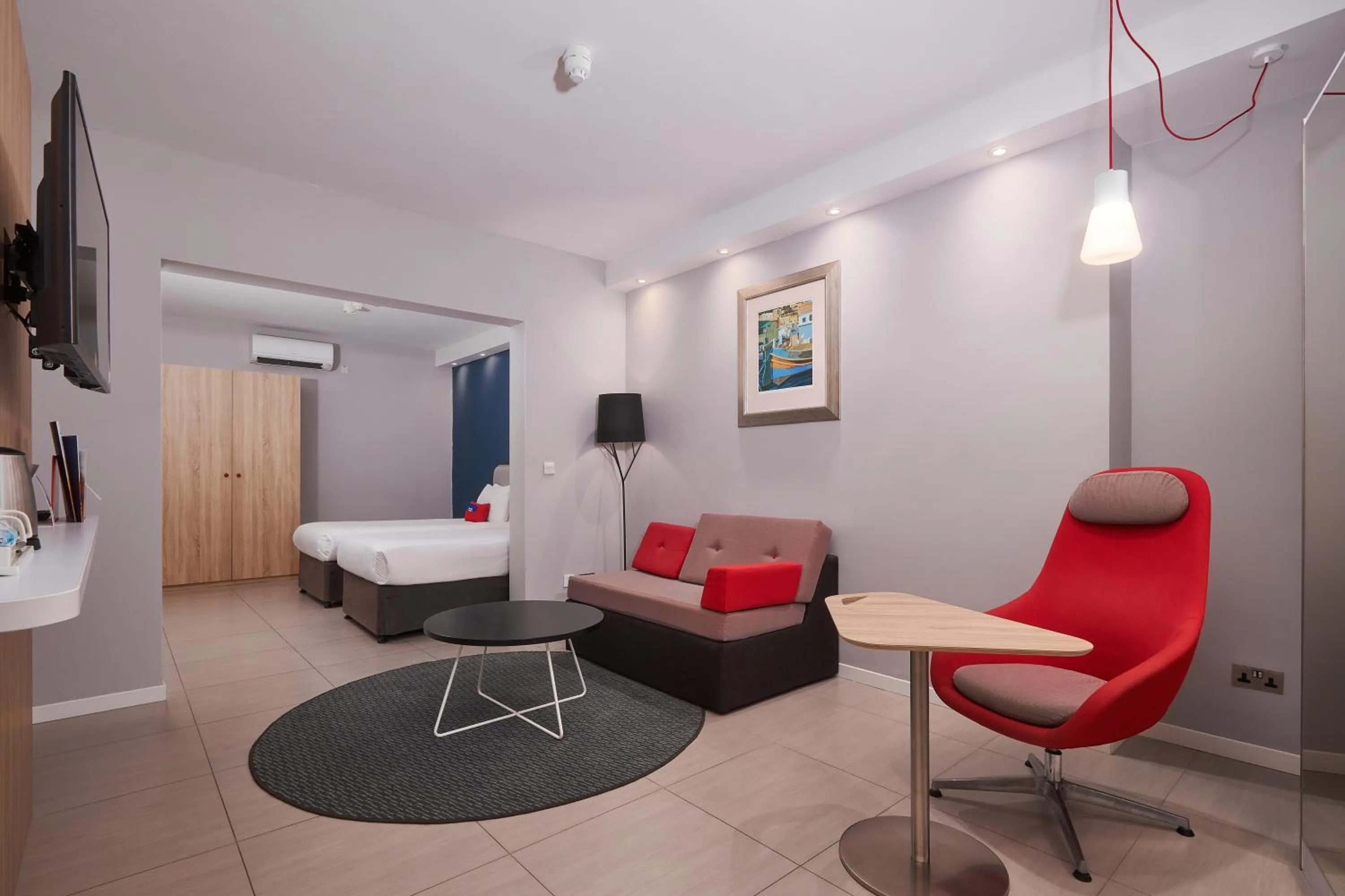Twin Suite with Two Twin Beds, Sofa Bed and Pool Access in Holiday Inn Express - Malta by IHG