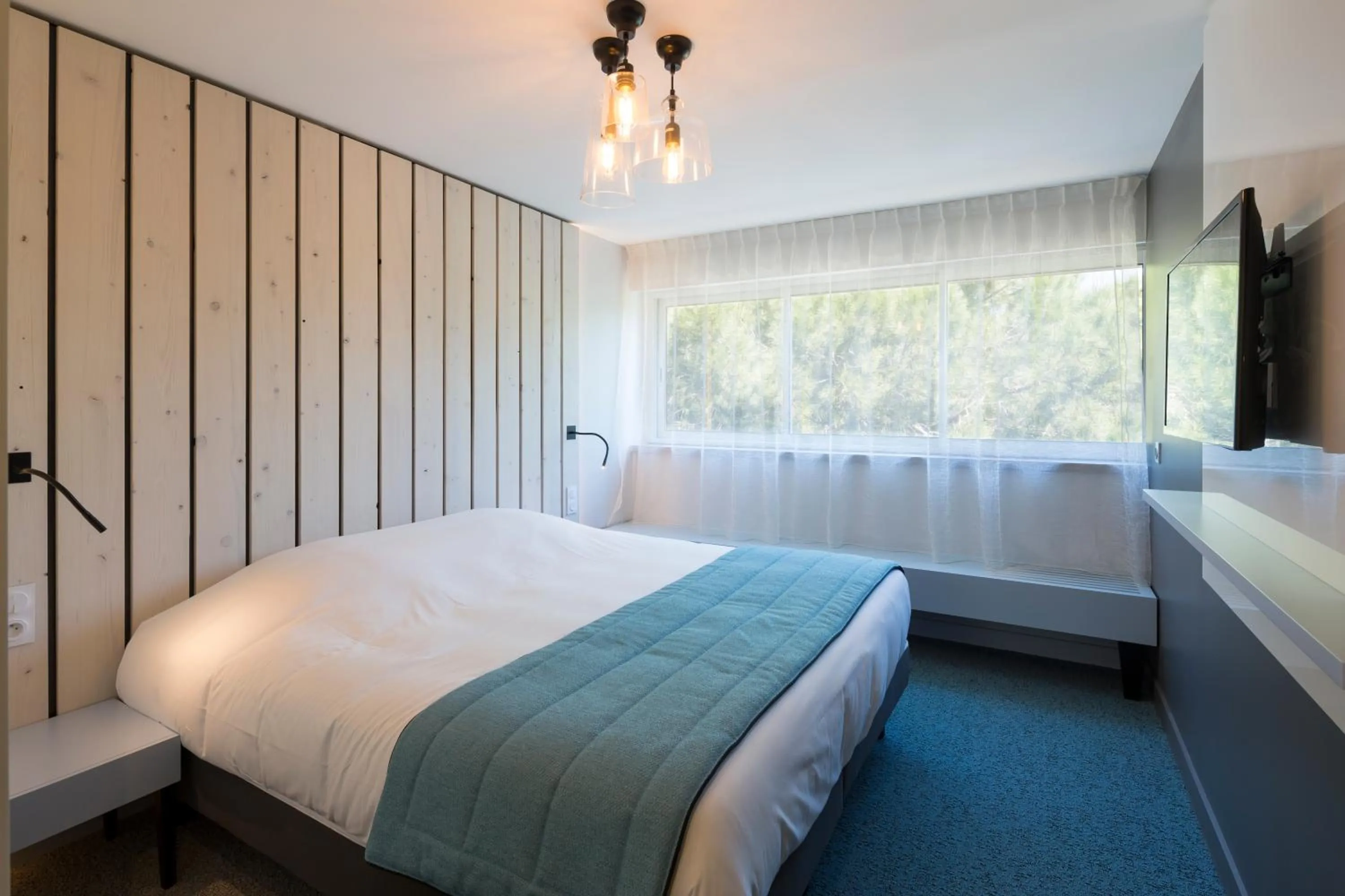 Suite with Garden View in Logis Hôtel Les Pins - Opéralia