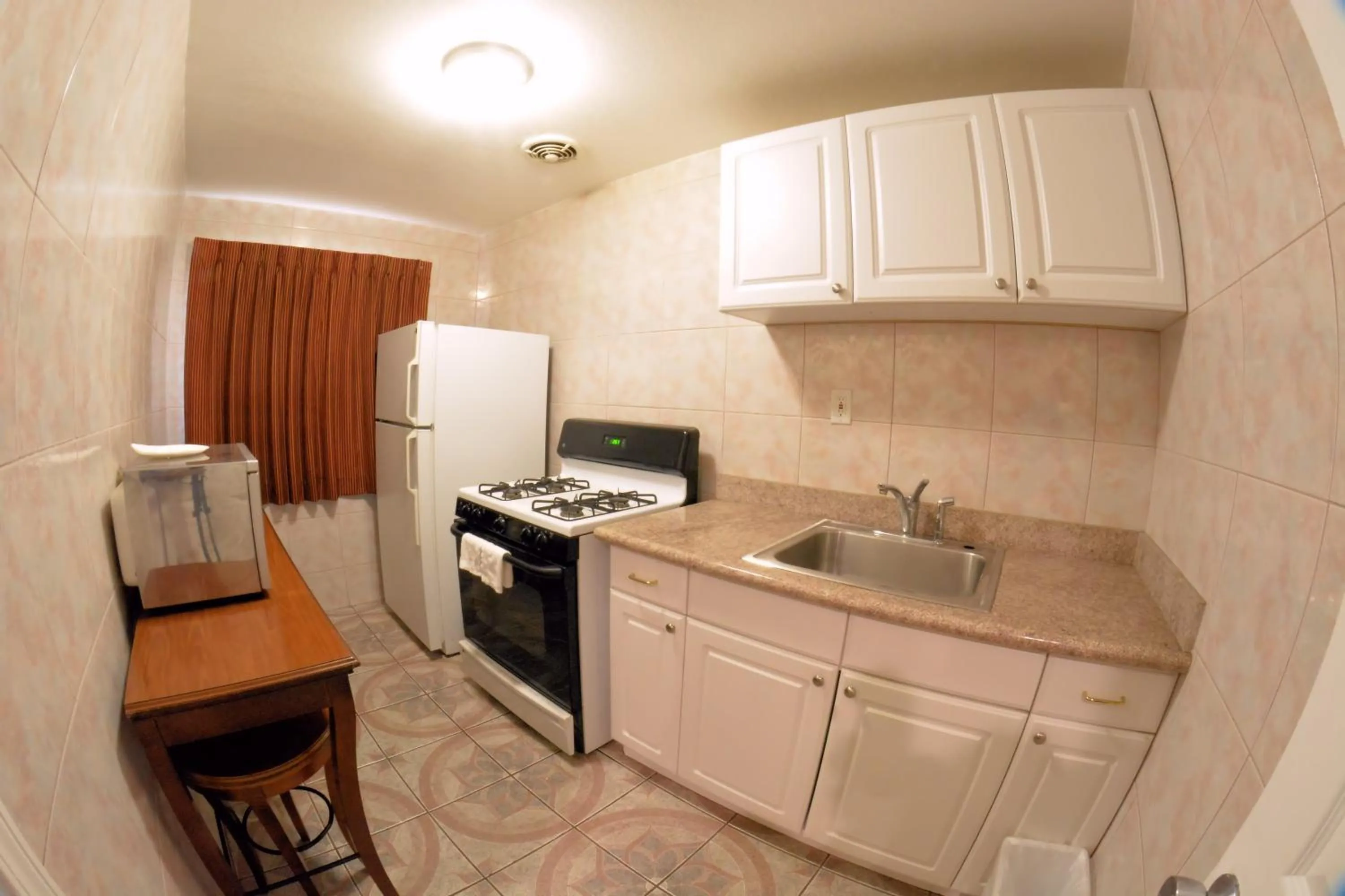 Deluxe King Room with Kitchen in The Palace Inn
