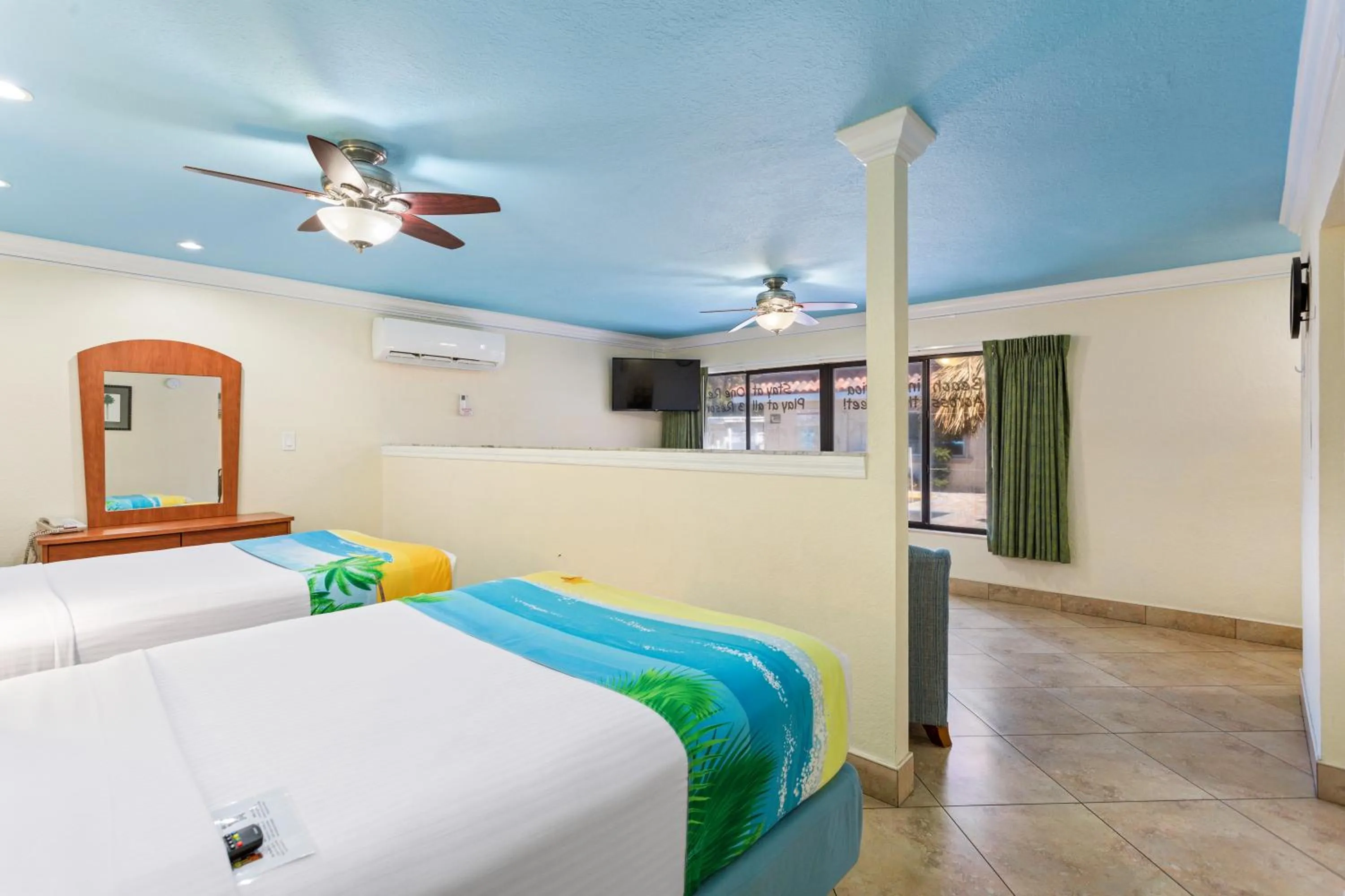 Superior Efficiency Suite: 2 Double Beds in Bedroom and 1 Sleeper Sofa in Bayview Plaza Waterfront Resort