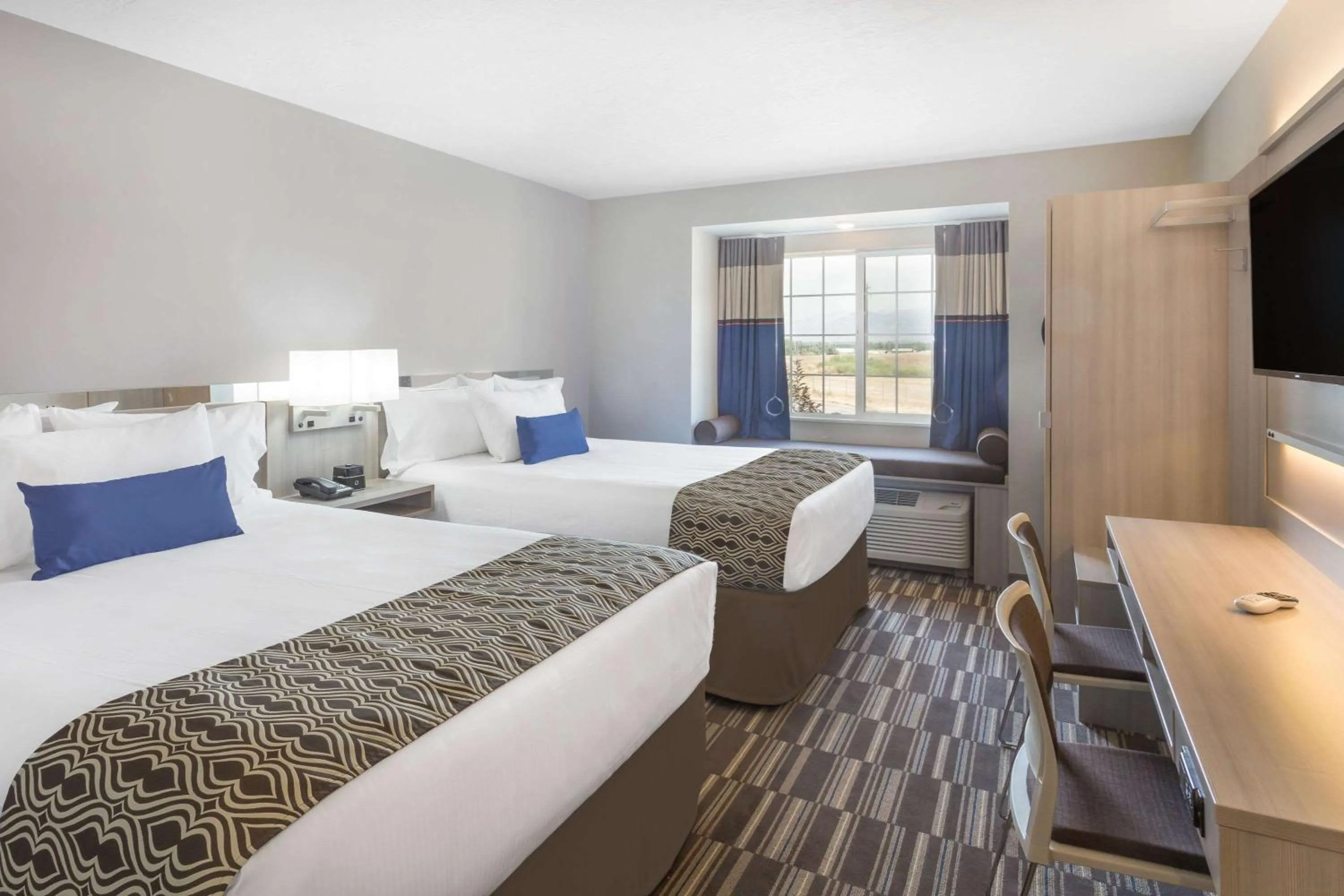 Queen Room with Two Queen Beds - Mobility Access/Non-Smoking in Microtel Inn & Suites by Wyndham Springville