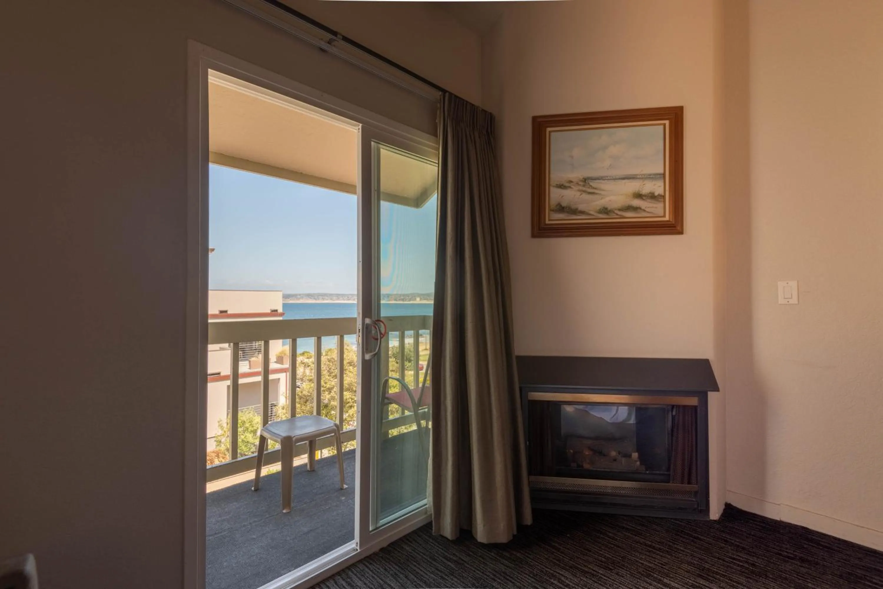 King Room with Partial Ocean View and Fireplace in Cannery Row Inn
