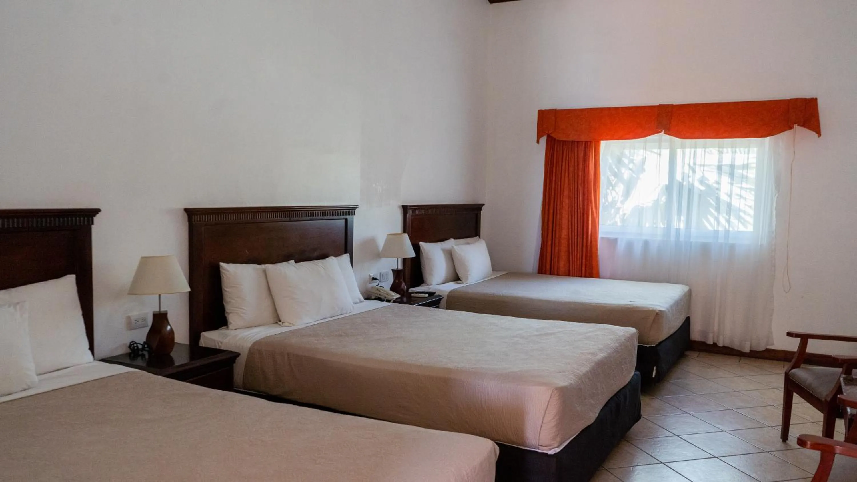 Standard Triple Room in Hotel Cayman Suites