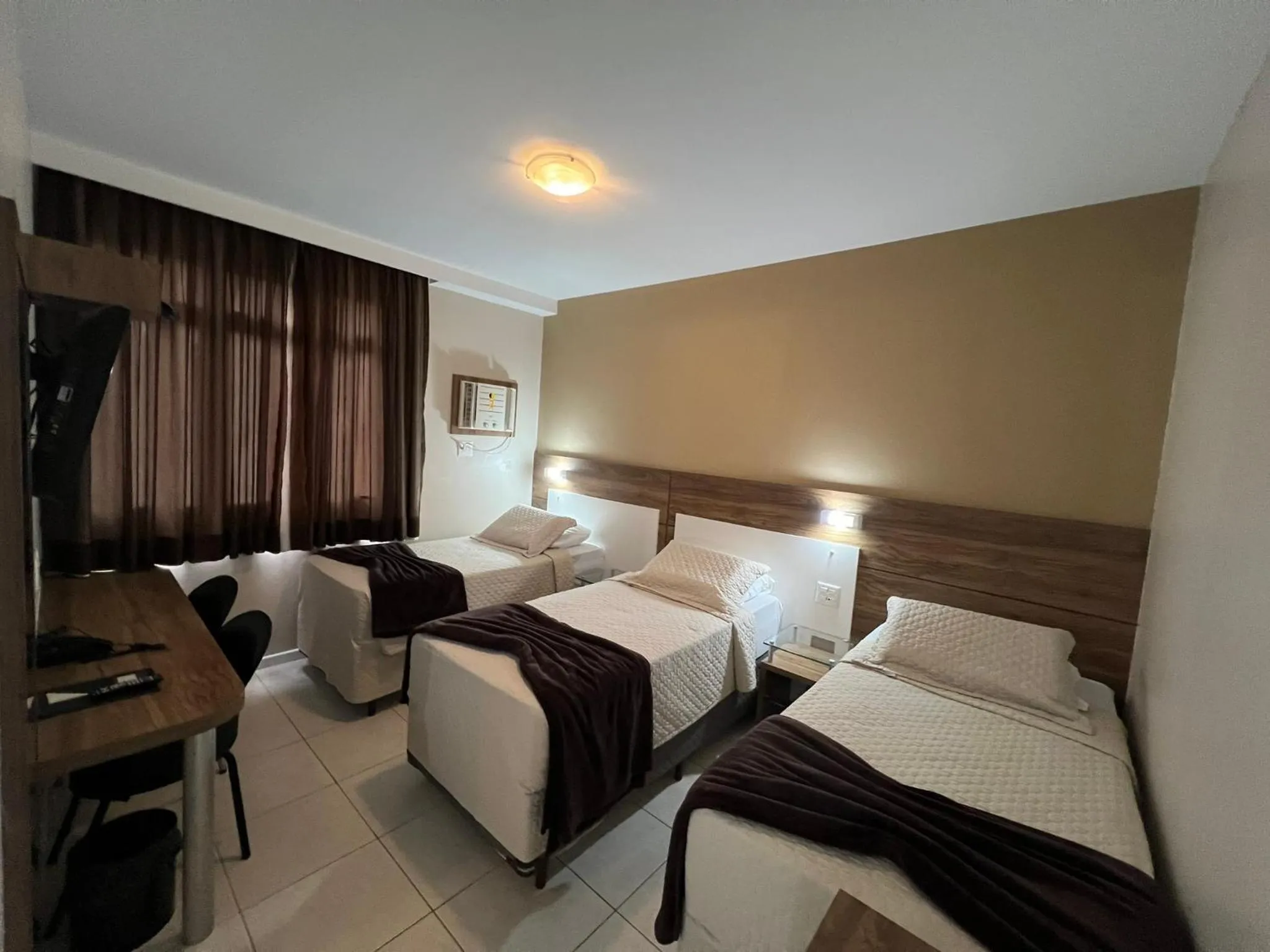 Deluxe Triple Room in Brisamar Suite Hotel