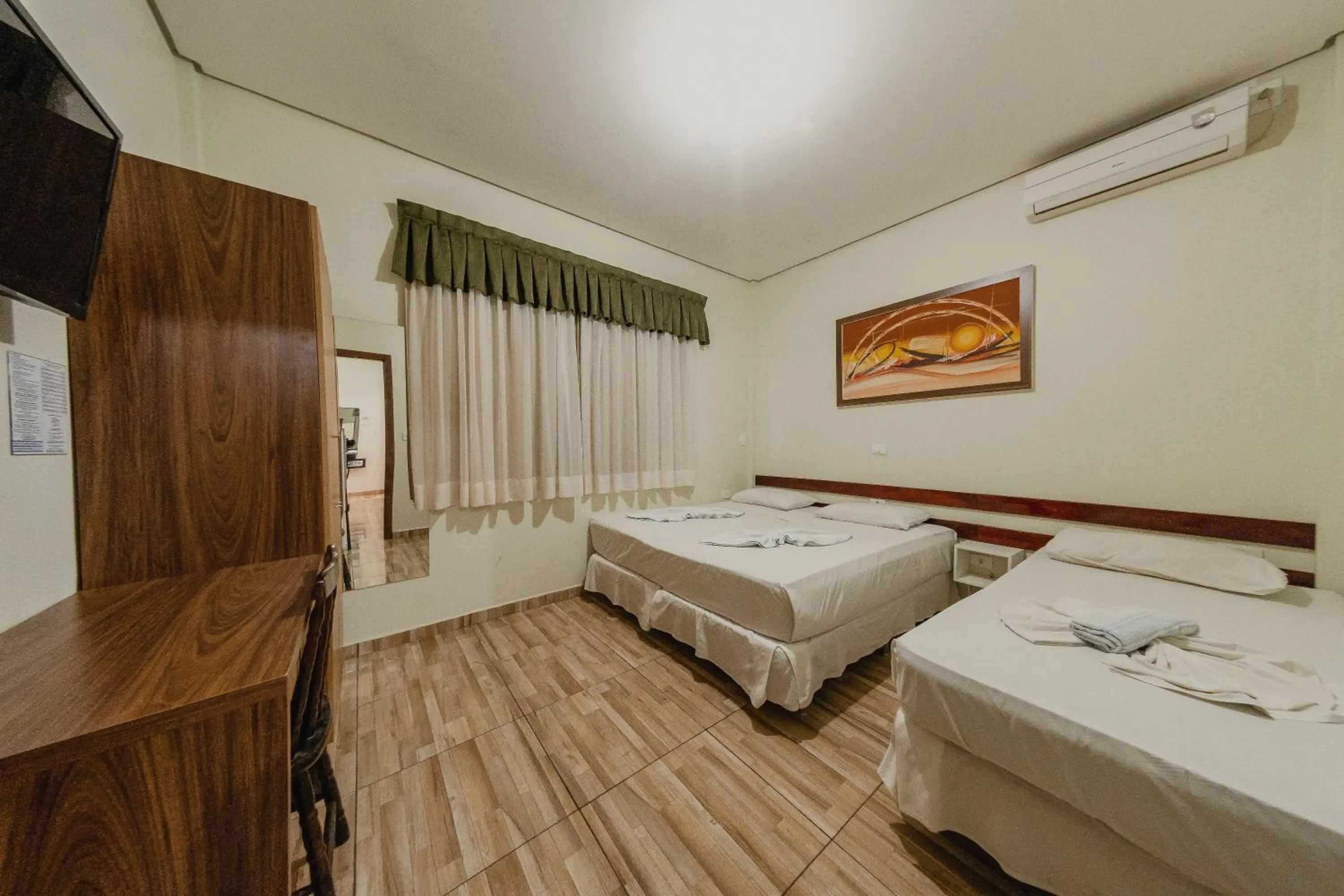 Quarto Familiar standard  (Bloco 02) in Hotel e Pousada Caroline