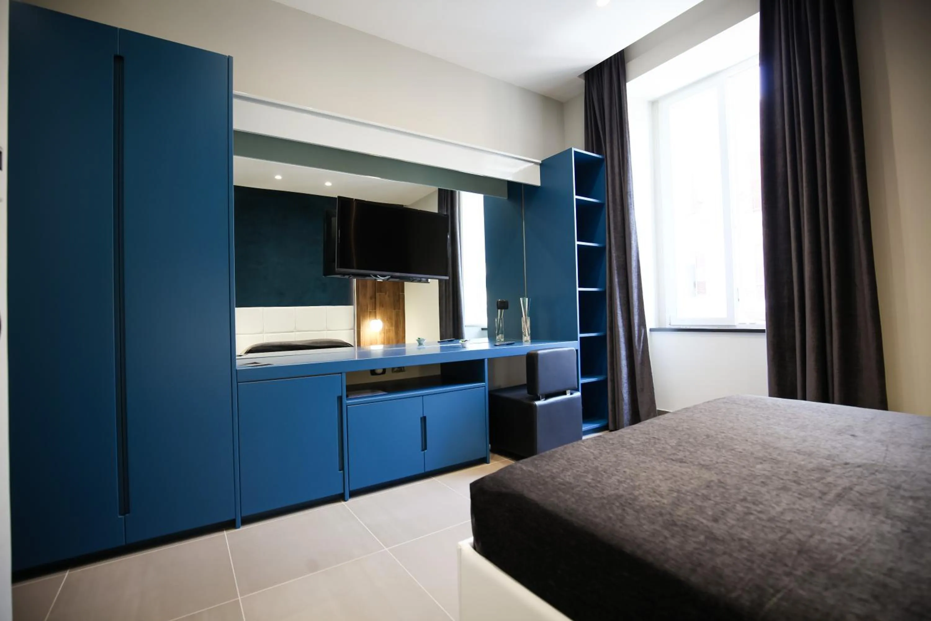 Deluxe Double Room with Partial Sea View - single occupancy in Gramsci 21 Rooms