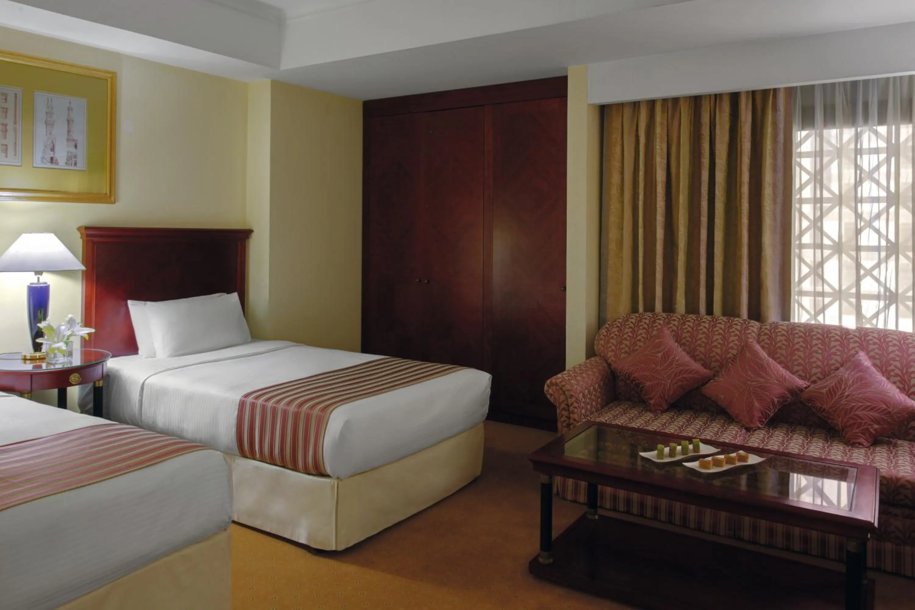 Corner Family Suite with One King and Two Twin Beds in New Madinah Hotel