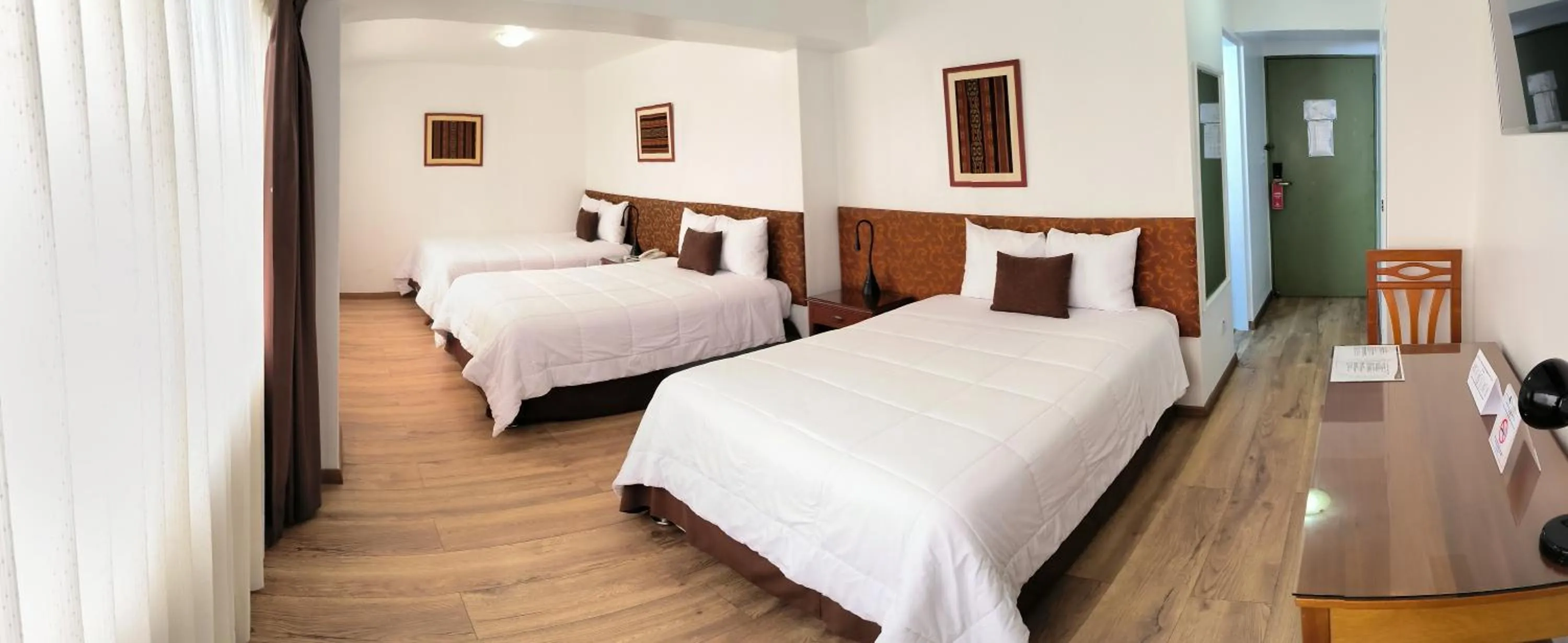 Superior Triple Room in Faraona Grand Hotel