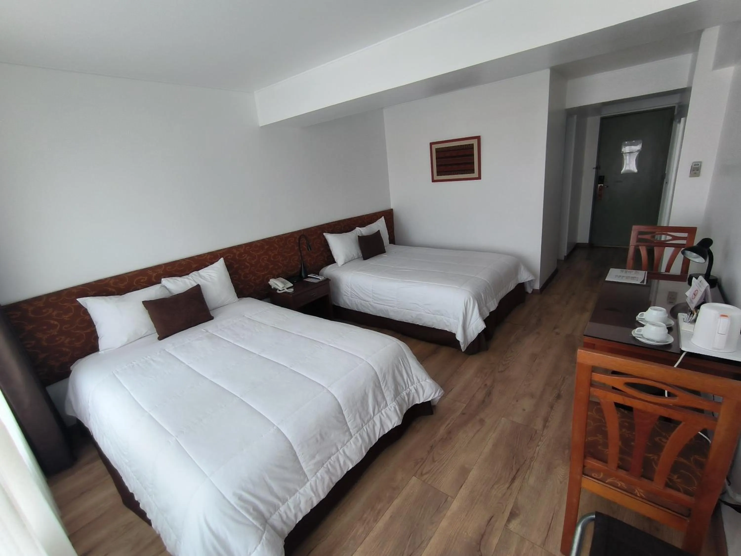 Twin Room in Faraona Grand Hotel