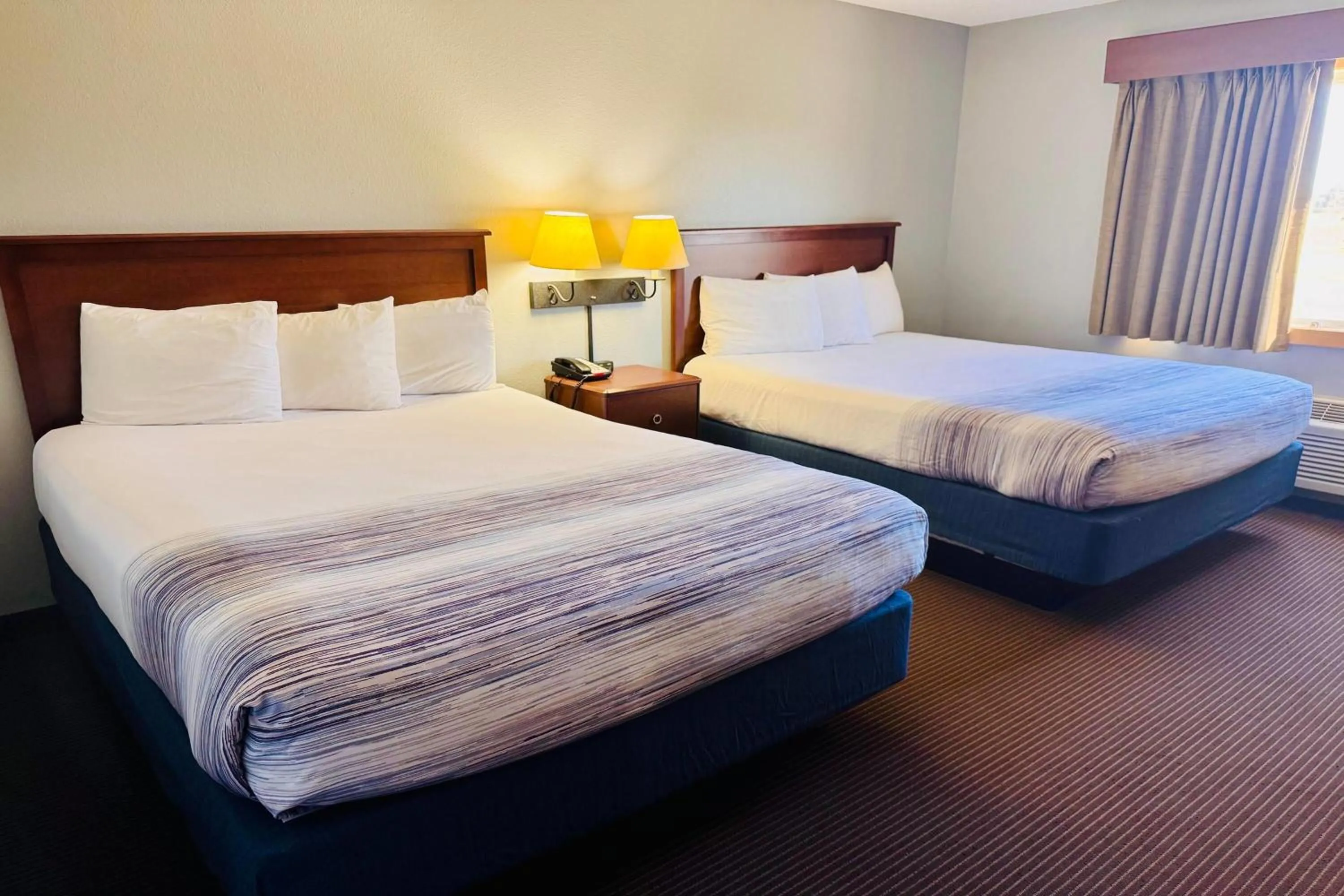 Queen Room with Two Queen Beds in AmericInn by Wyndham Stillwater