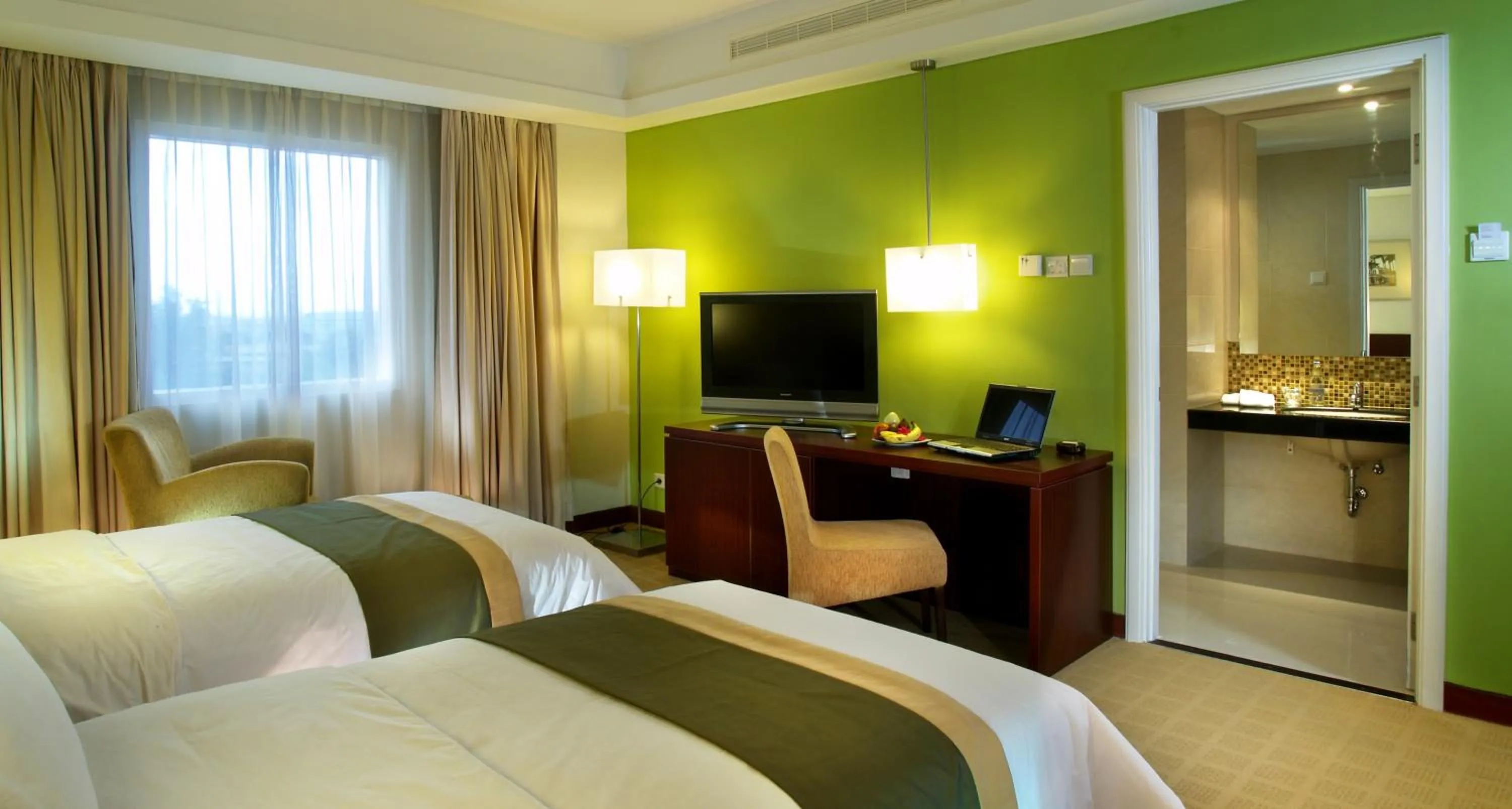 Deluxe Twin Room in Java Paragon Hotel & Residences