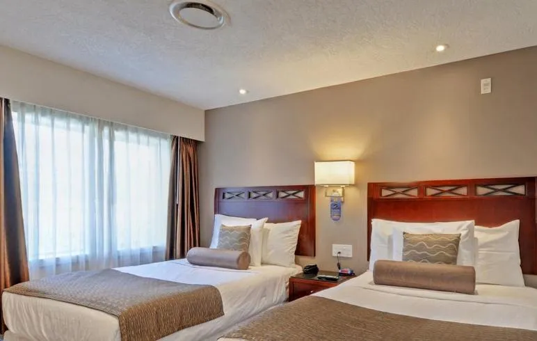 One Bedroom Suite with Two Double Beds & Sofa Bed in Red Lion Inn and Suites Victoria