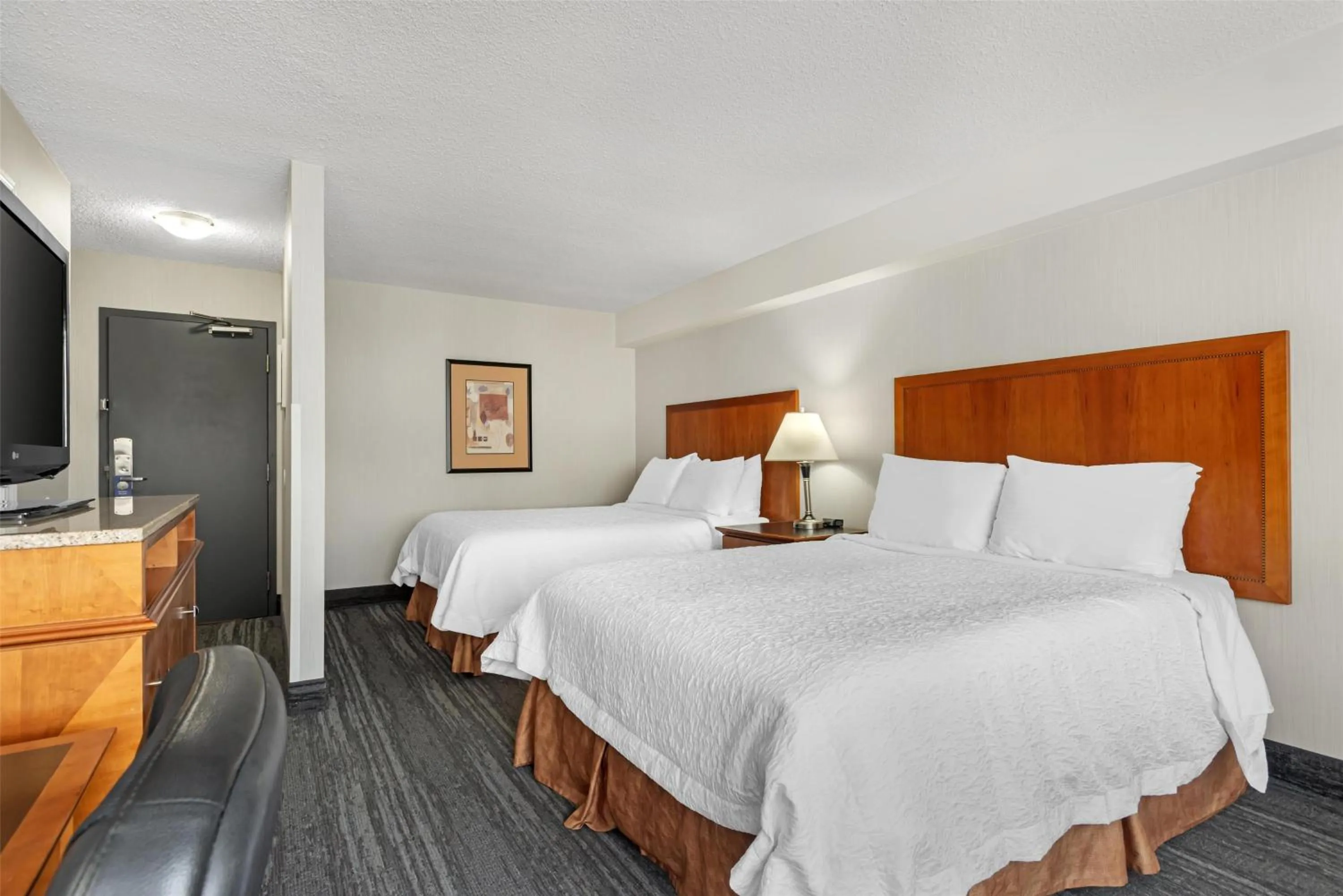 Queen Room with Two Queen Beds and Kitchenette in Best Western Plus Suites Downtown Calgary