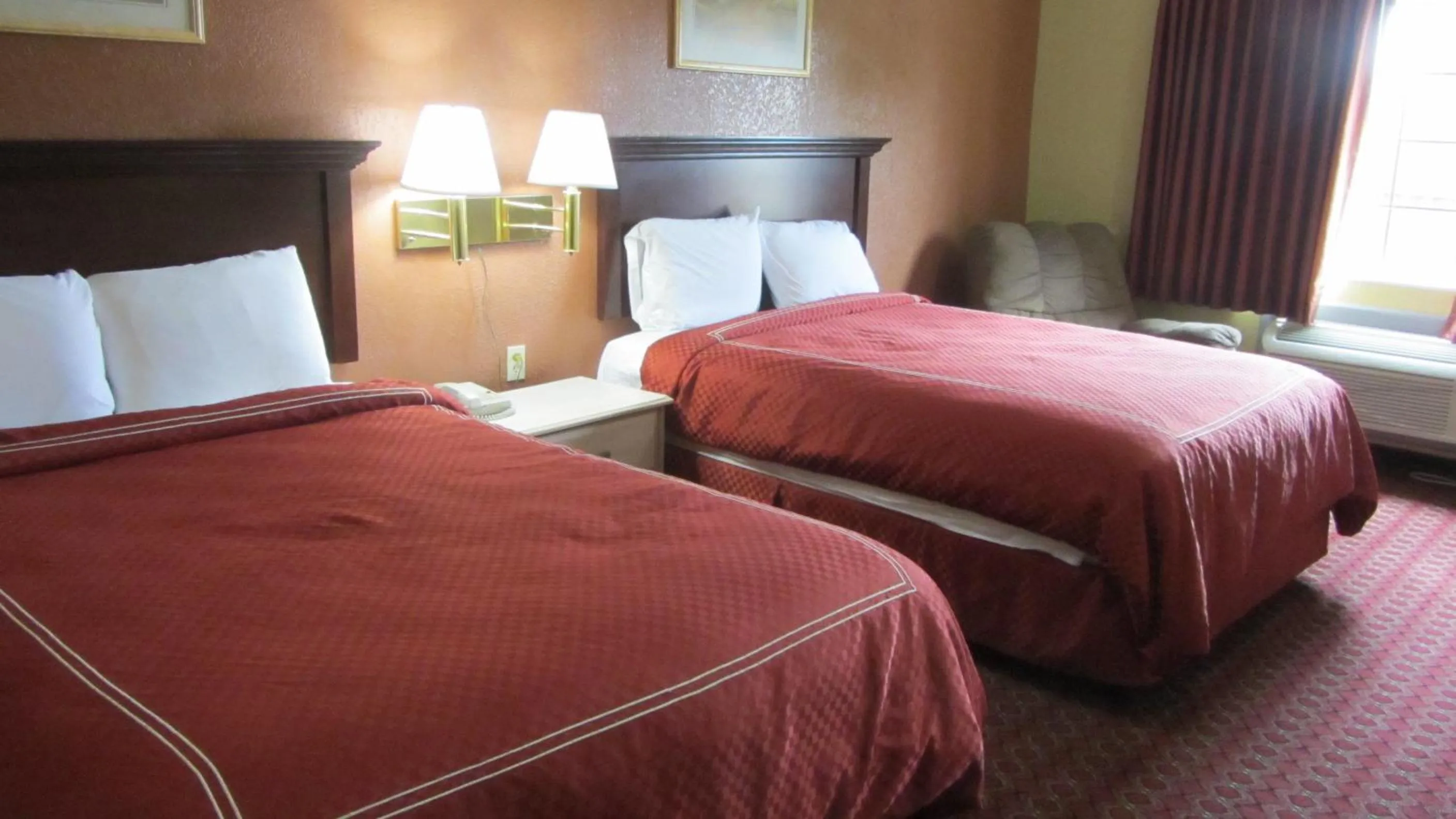 Queen Room with Two Queen Beds - Smoking in Americas Best Value Inn and Suites Houston FM 1960