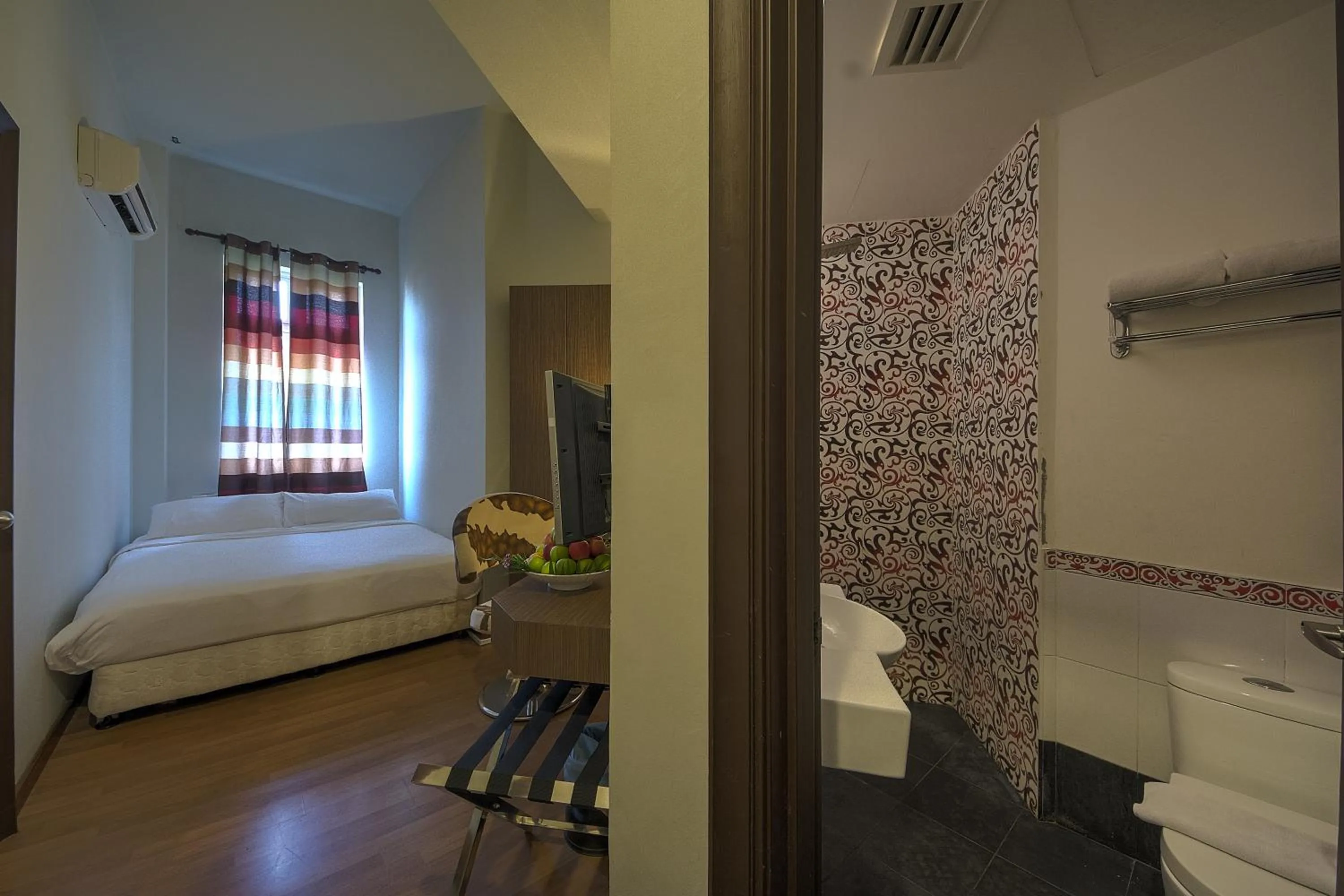 Junior Room in Arenaa Deluxe Hotel