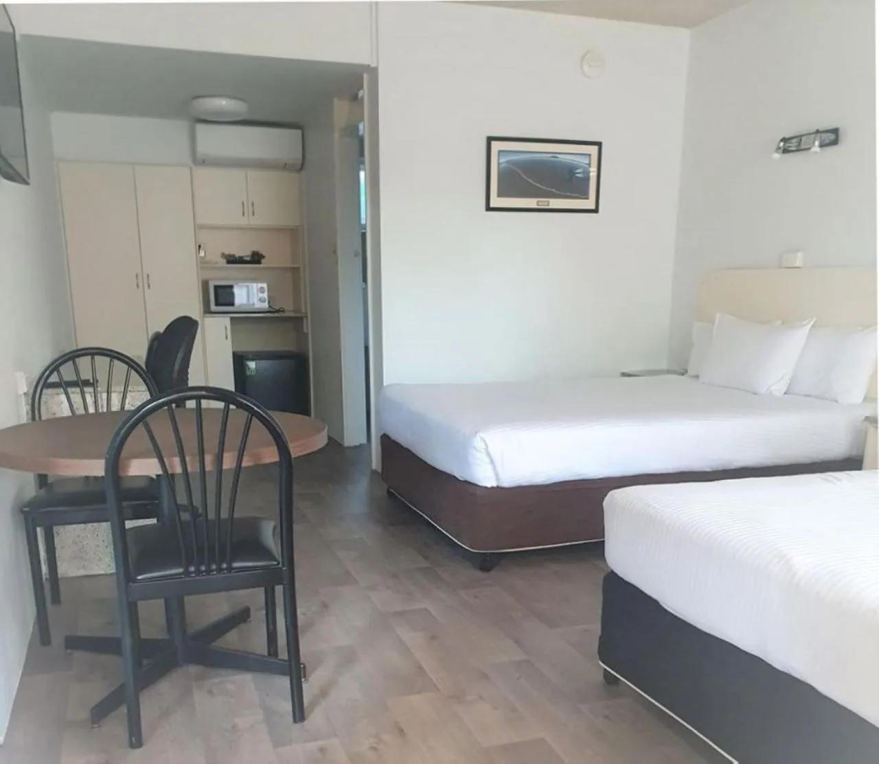 Pet Friendly Deluxe Family Room with Two Queen Beds in Zebra Motel