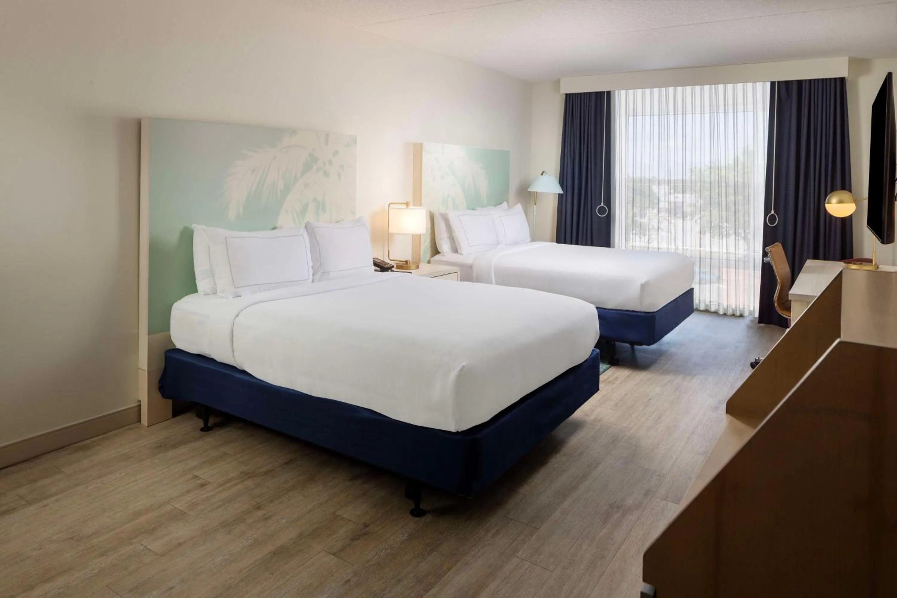 Queen Room with Two Queen Beds and Shower - Mobility and Hearing Accessible in Hotel Dello Ft Lauderdale Airport, Tapestry Collection by Hilton