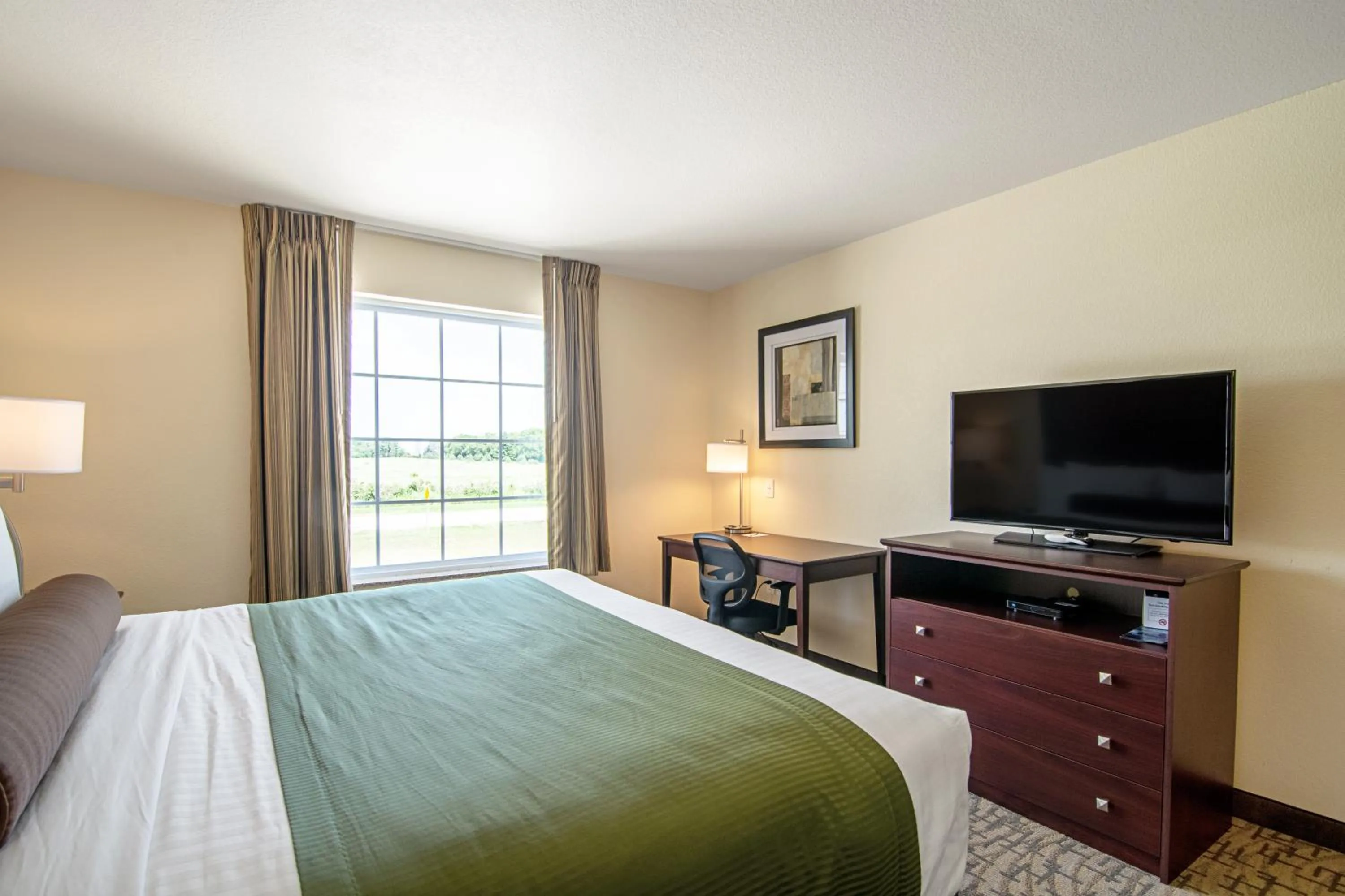 King Room in Cobblestone Hotel & Suites - Paxton