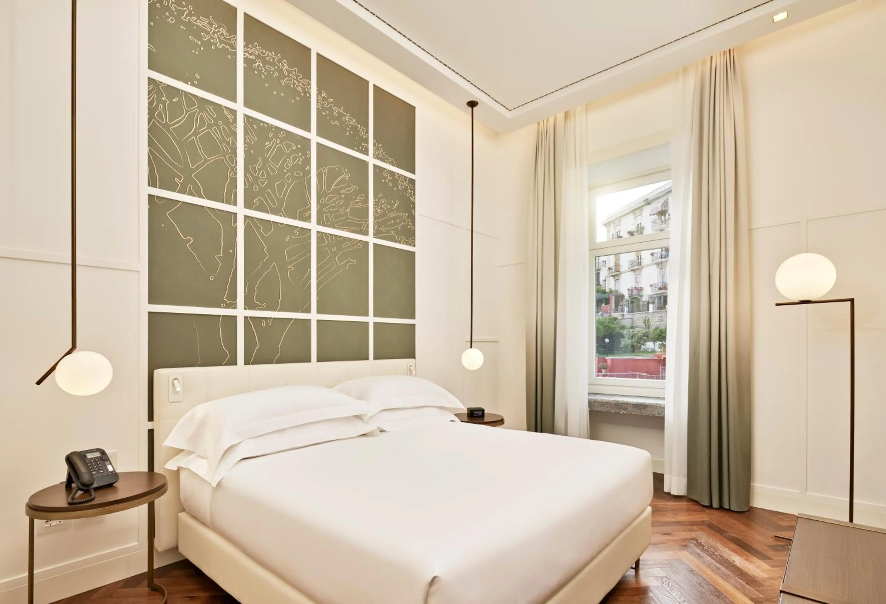 King Family Room in De Bonart Naples, Curio Collection By Hilton