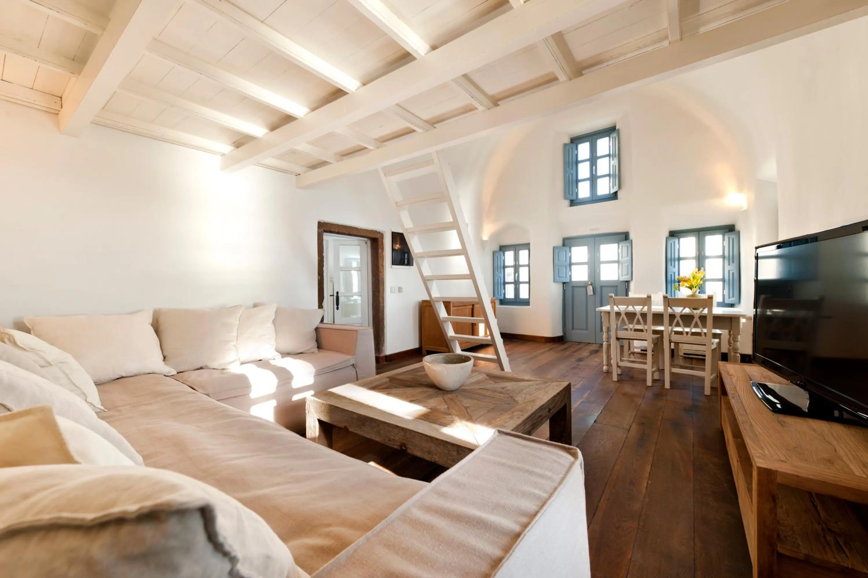 Loft Suite with access to Terrace with Shared Hot tub and Panoramic Caldera View in Kapari Natural Resort