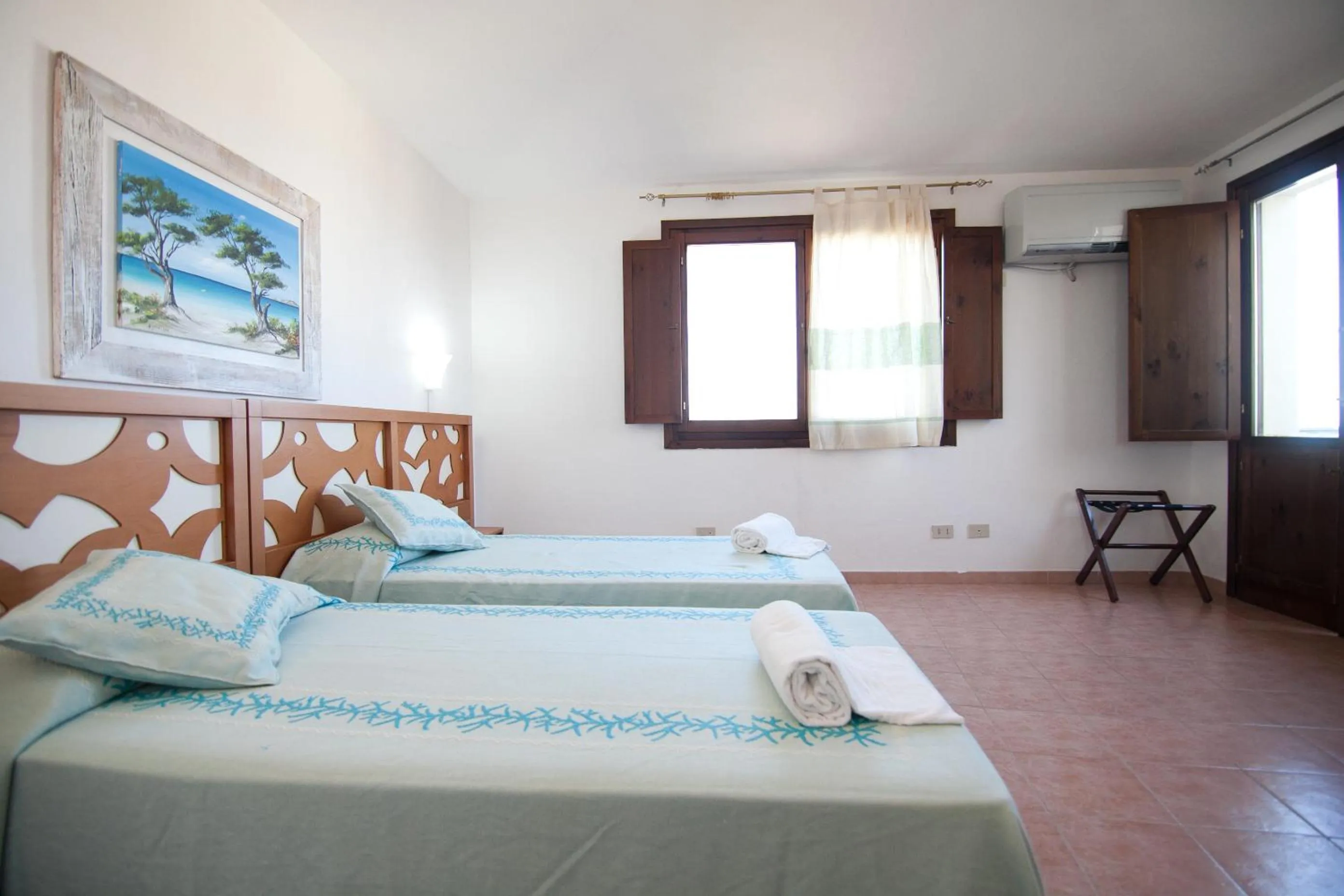 Quadruple Room in Club Esse Gallura