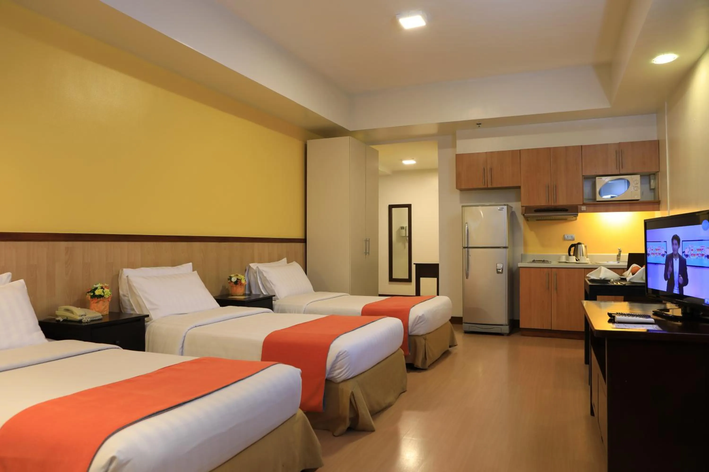 Studio Triple Deluxe Room in The Malayan Plaza Hotel