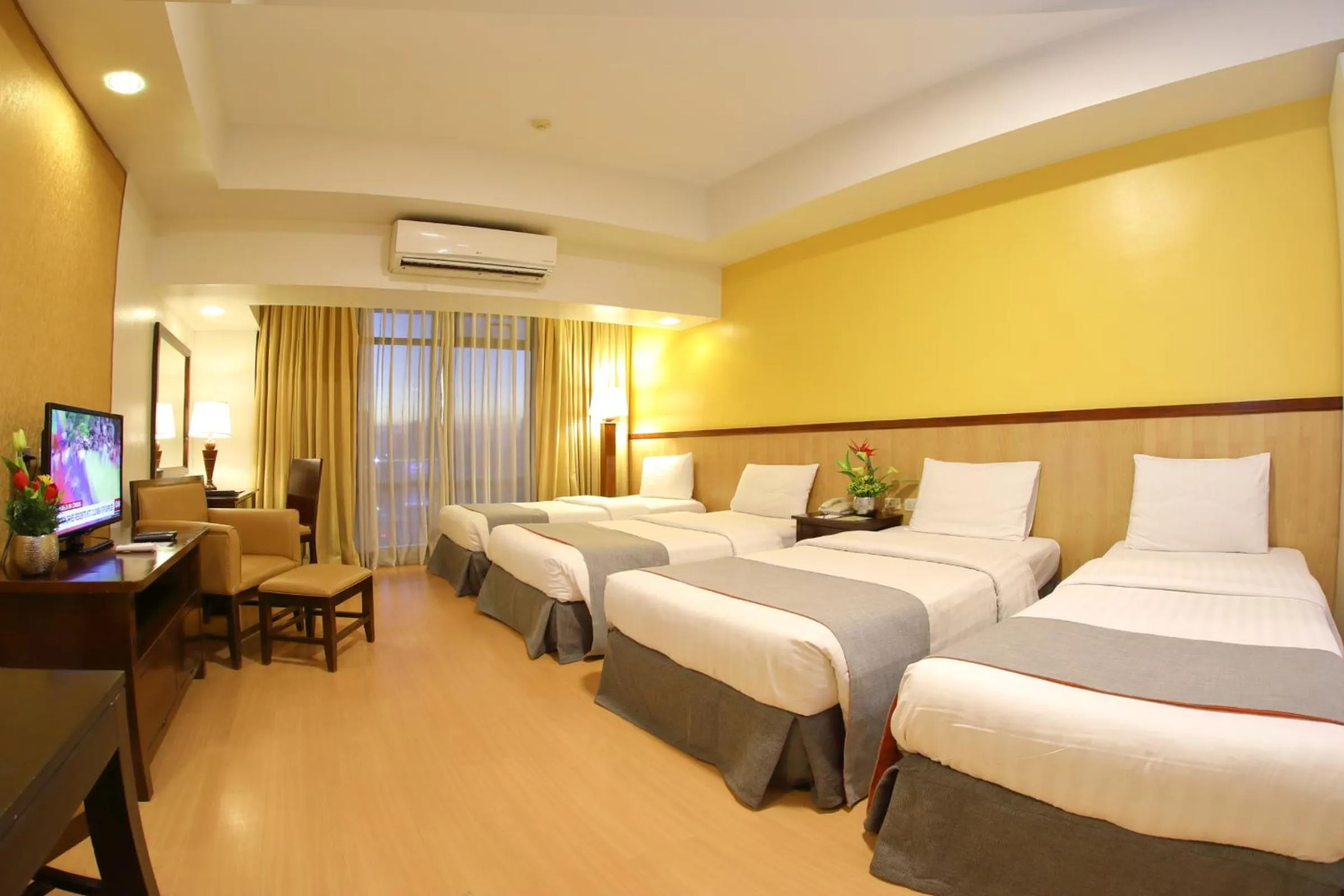 Studio Quadruple Room in The Malayan Plaza Hotel