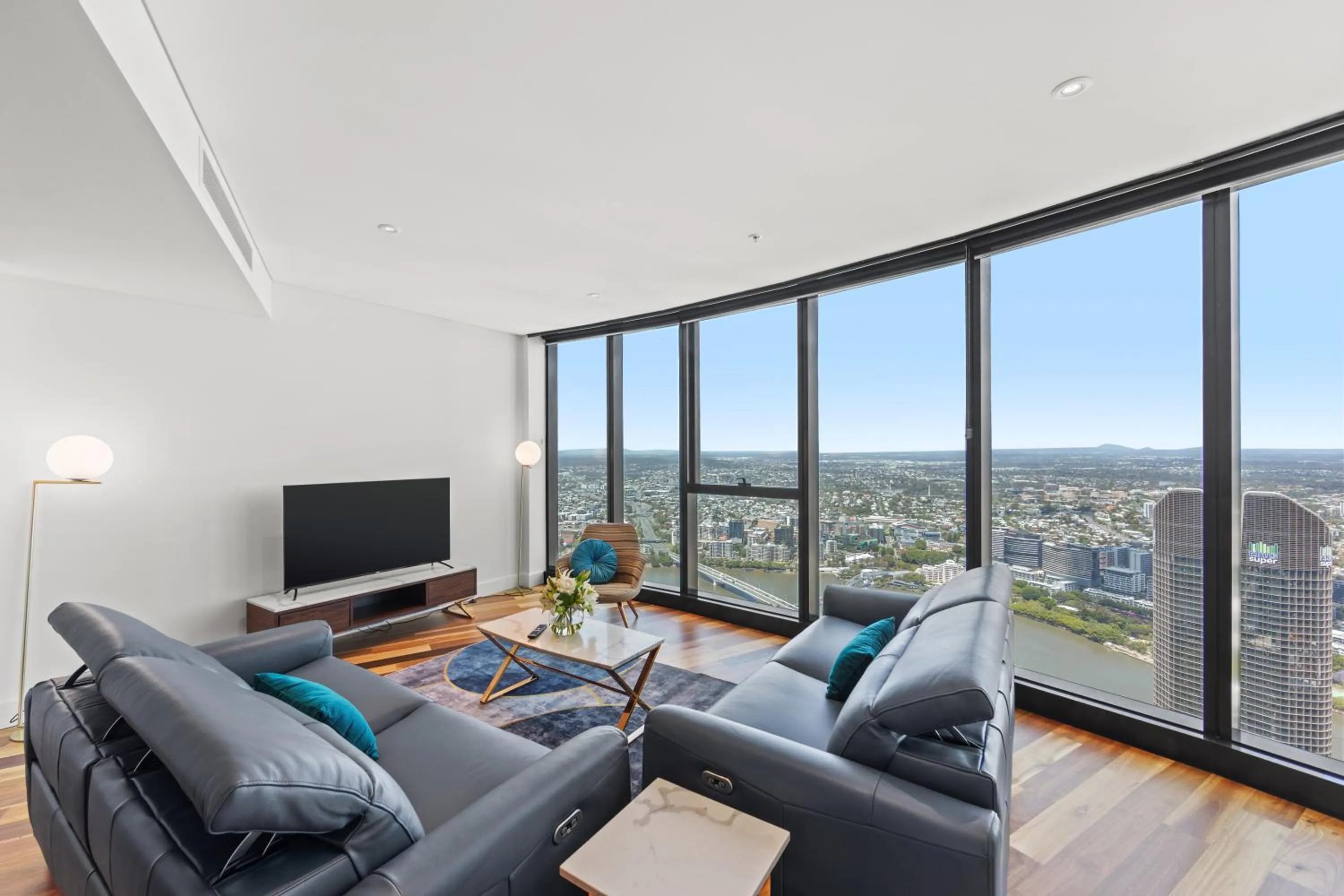 Three-Bedroom Two Bathroom Sky High River View Executive Apartment in Brisbane Skytower by CLLIX