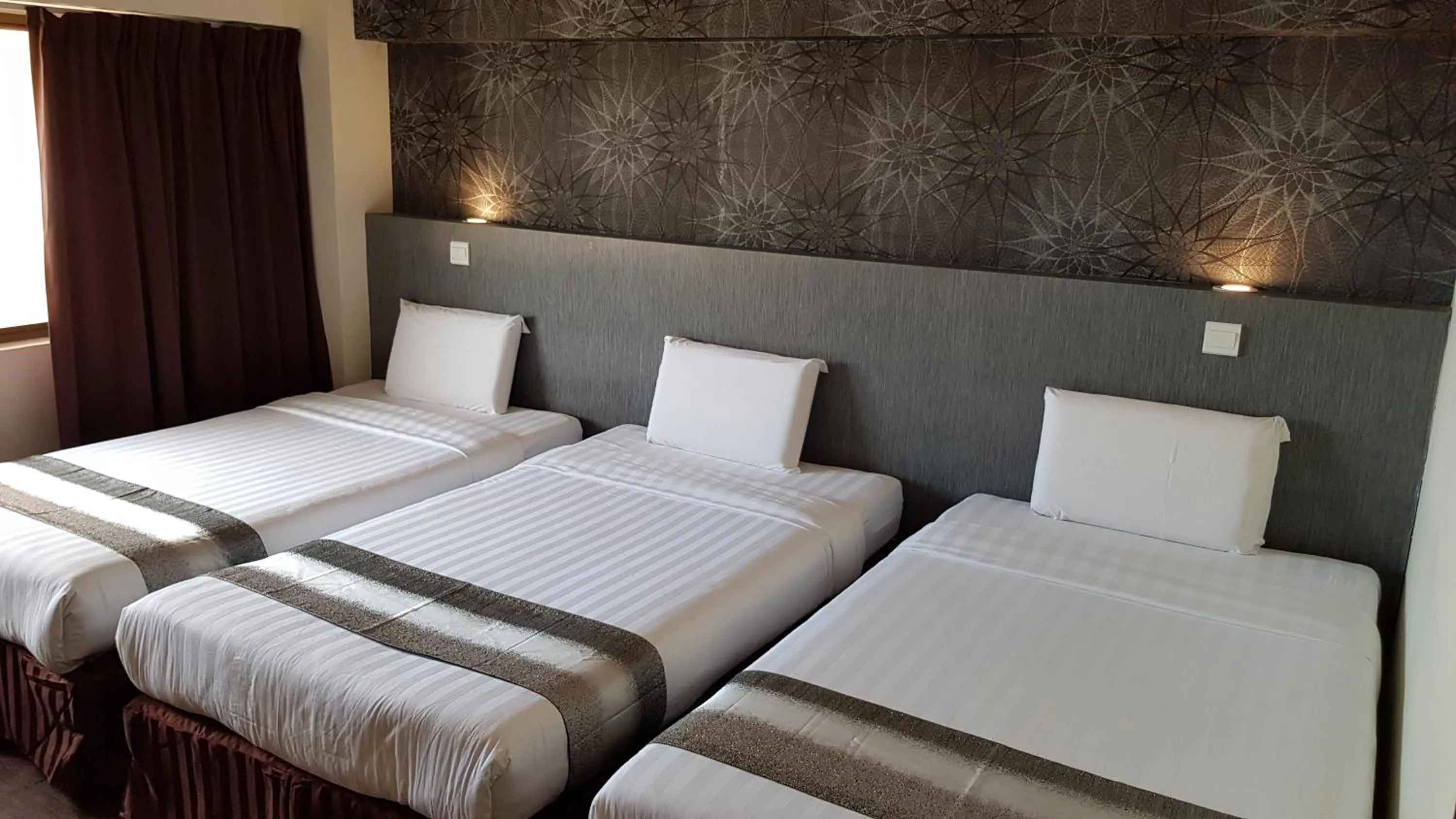 Superior Triple Room in Check Inn Hotel Tawau