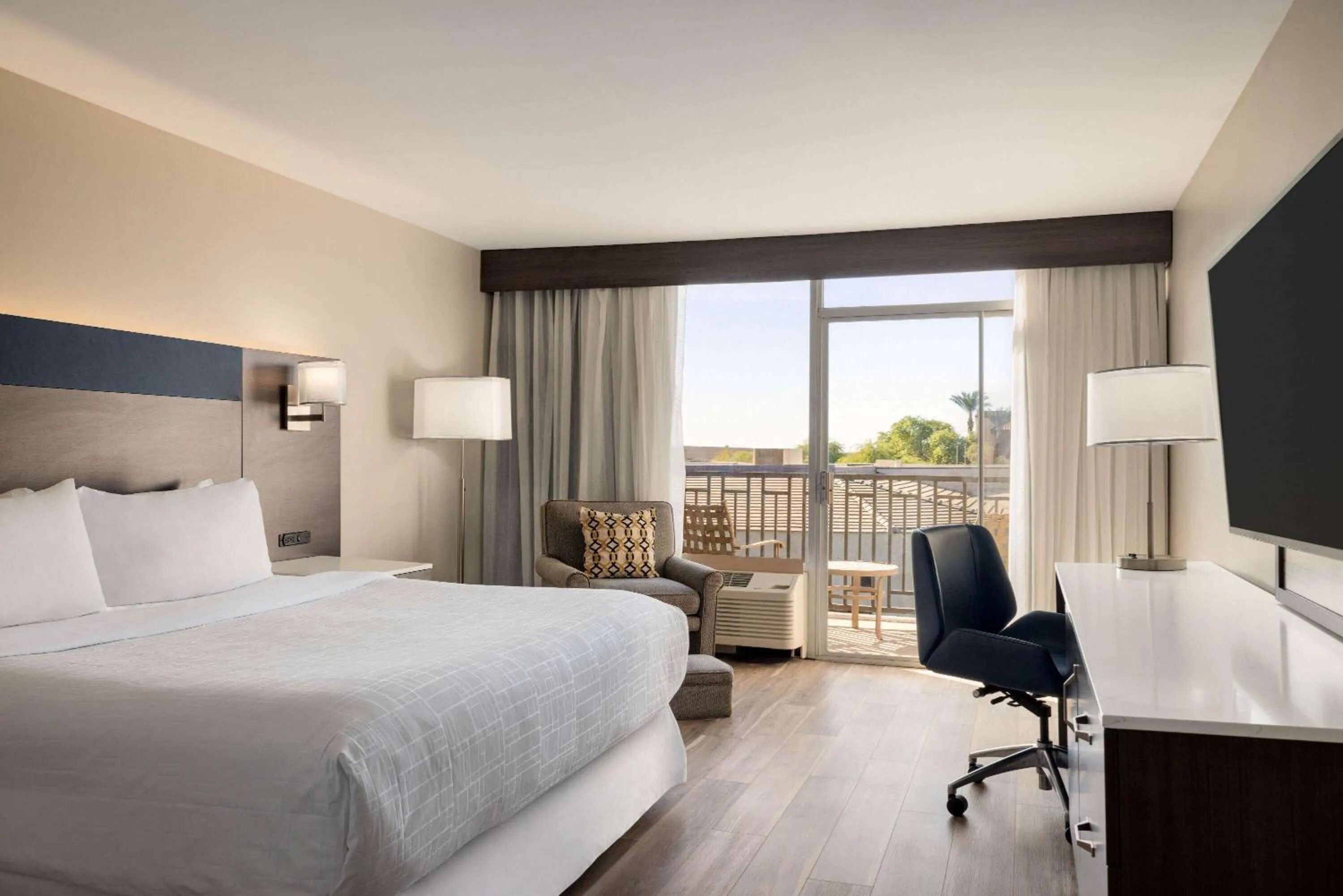 King Deluxe Room with Pool View and Balcony -  Non-Smoking in Wyndham Phoenix Airport - Tempe