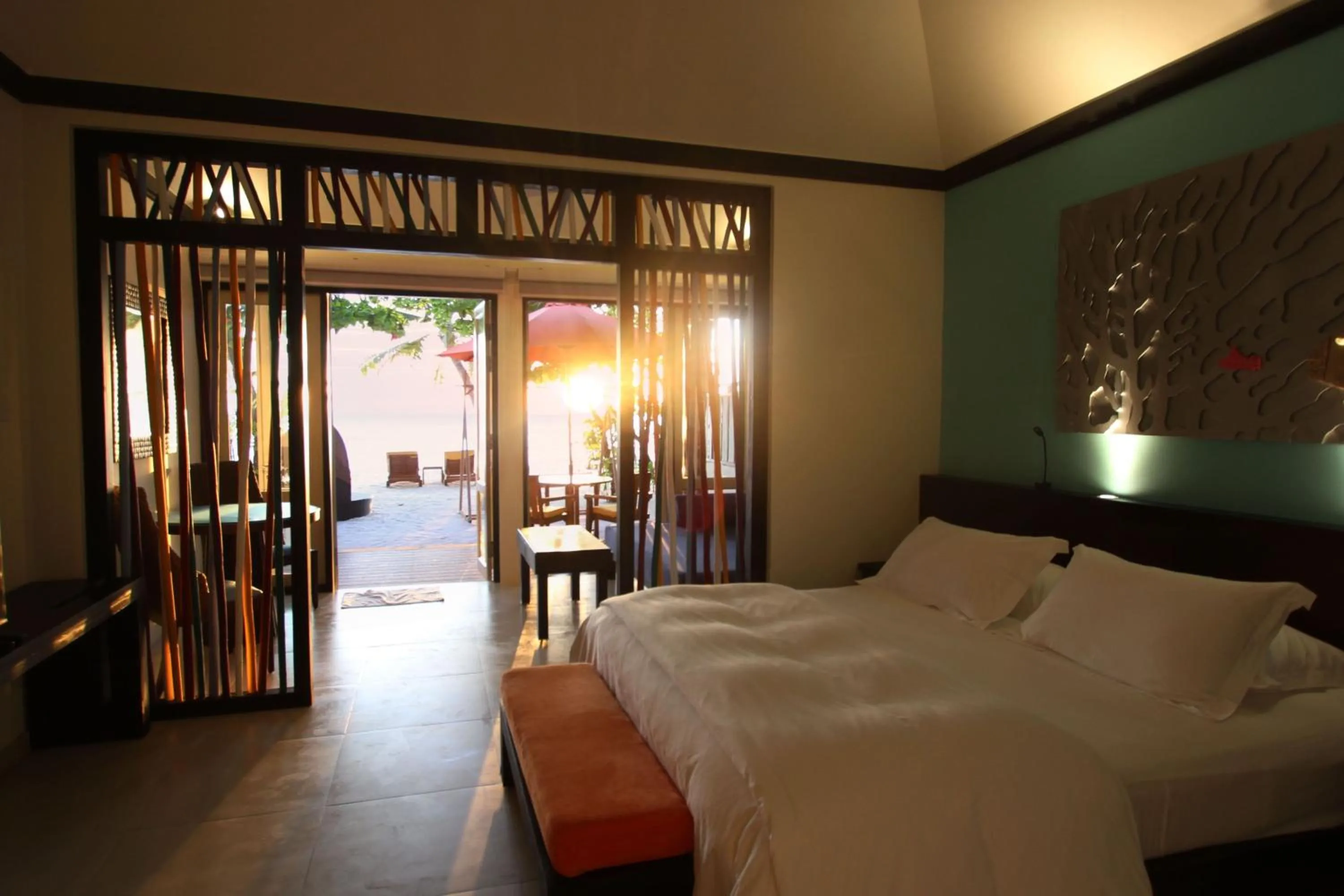 Beachfront Sunset Villa with Free transfer in Dhawa Ihuru, part of Banyan Group