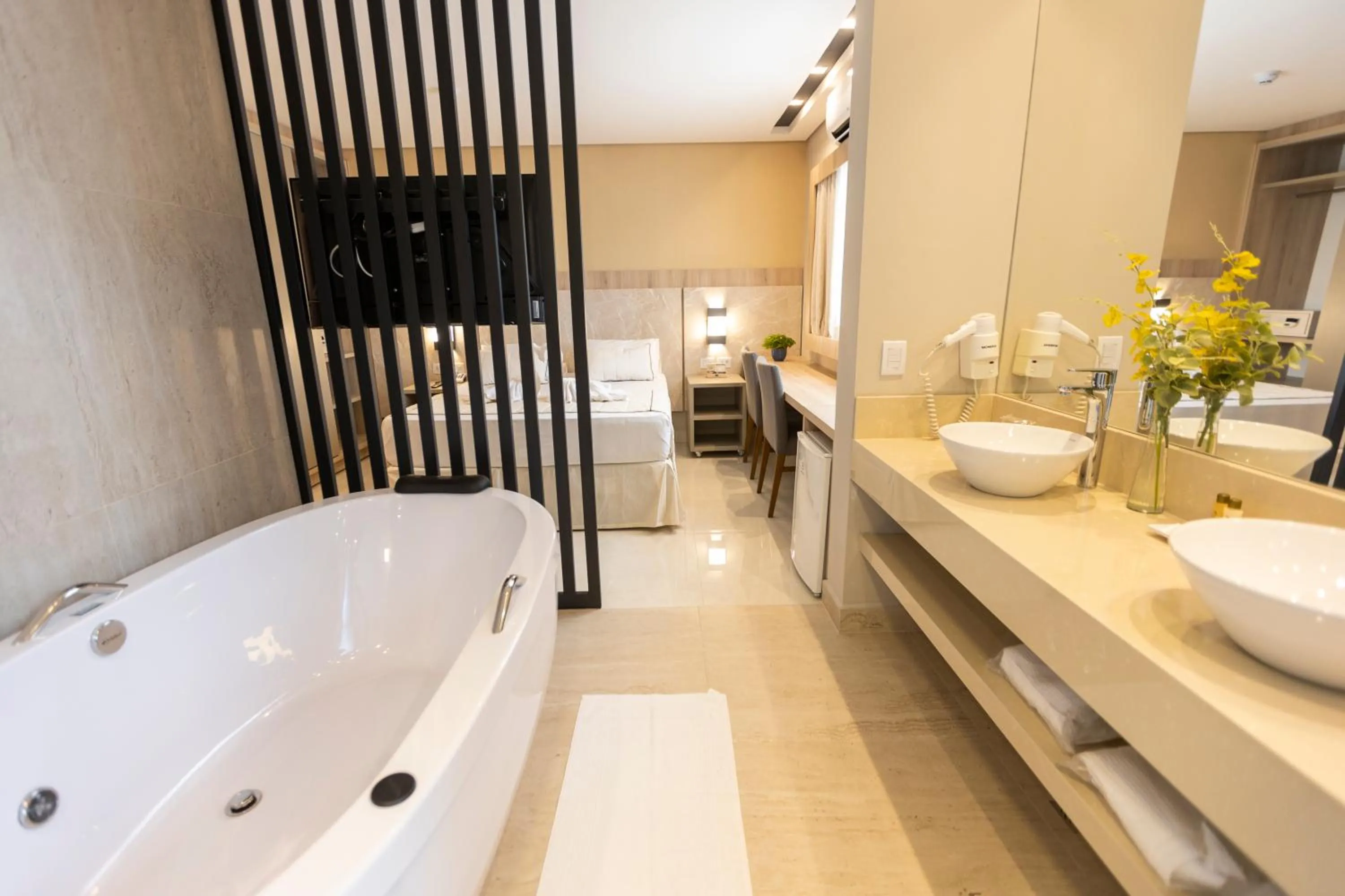 Suíte Junior in Nadai Confort Hotel e Spa