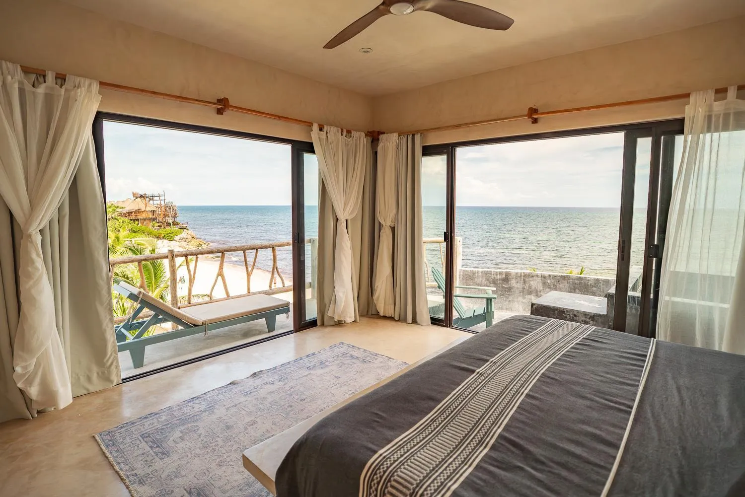 Master Deluxe Oceanfront king size bed with plunge pool and terrace in La Posada del Sol Boutique Hotel Tulum