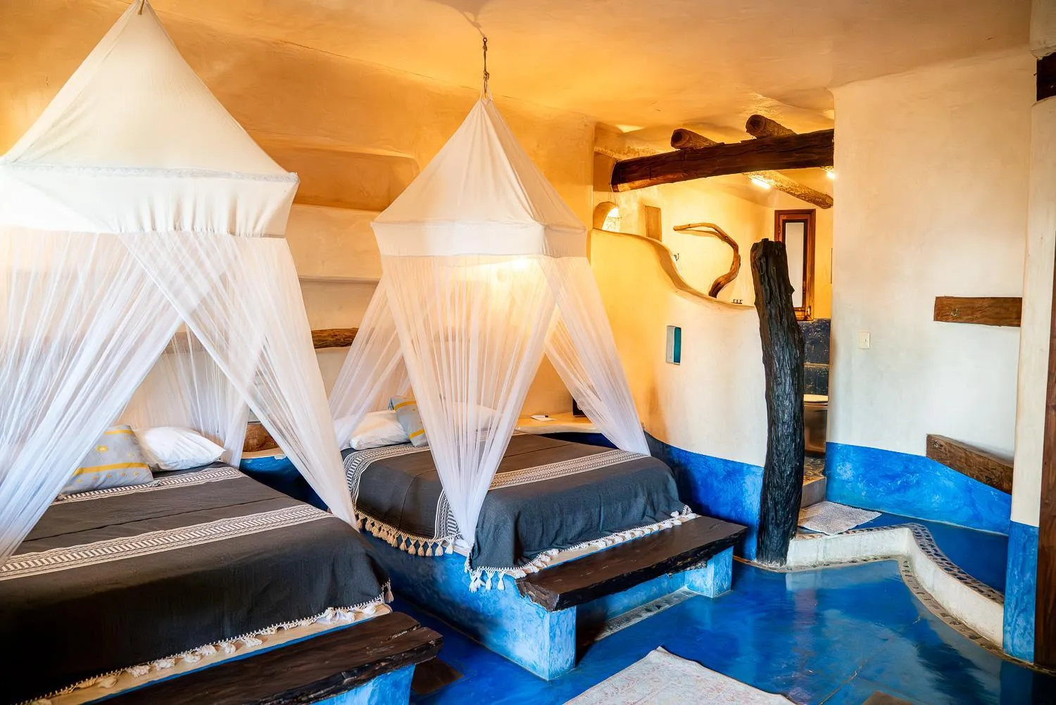 Room with Partial Ocean View two double beds in La Posada del Sol Boutique Hotel Tulum